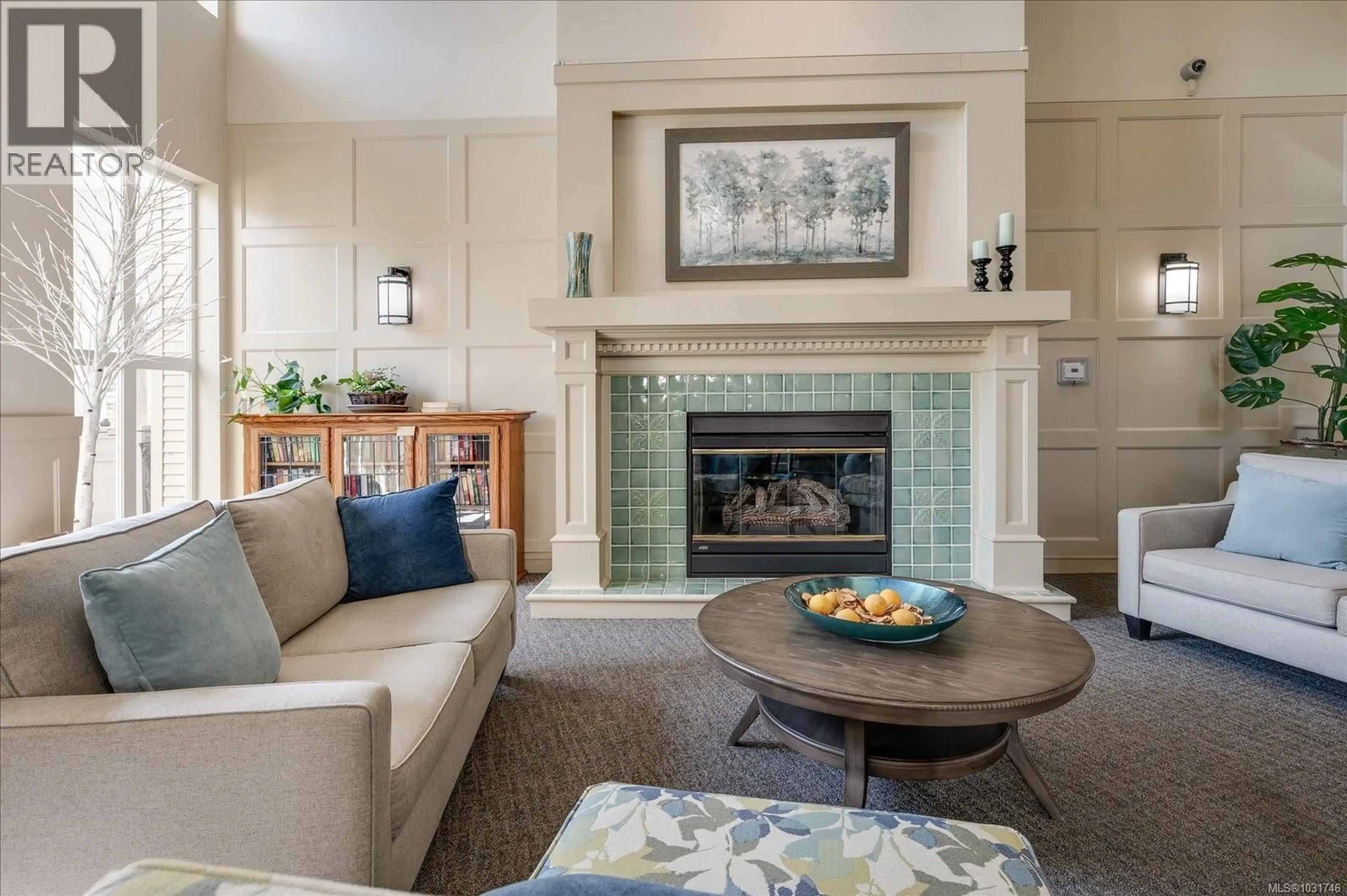 Living room with furniture, ceramic/tile floor for 402 - 5685 EDGEWATER LANE, Nanaimo British Columbia V9T6K3