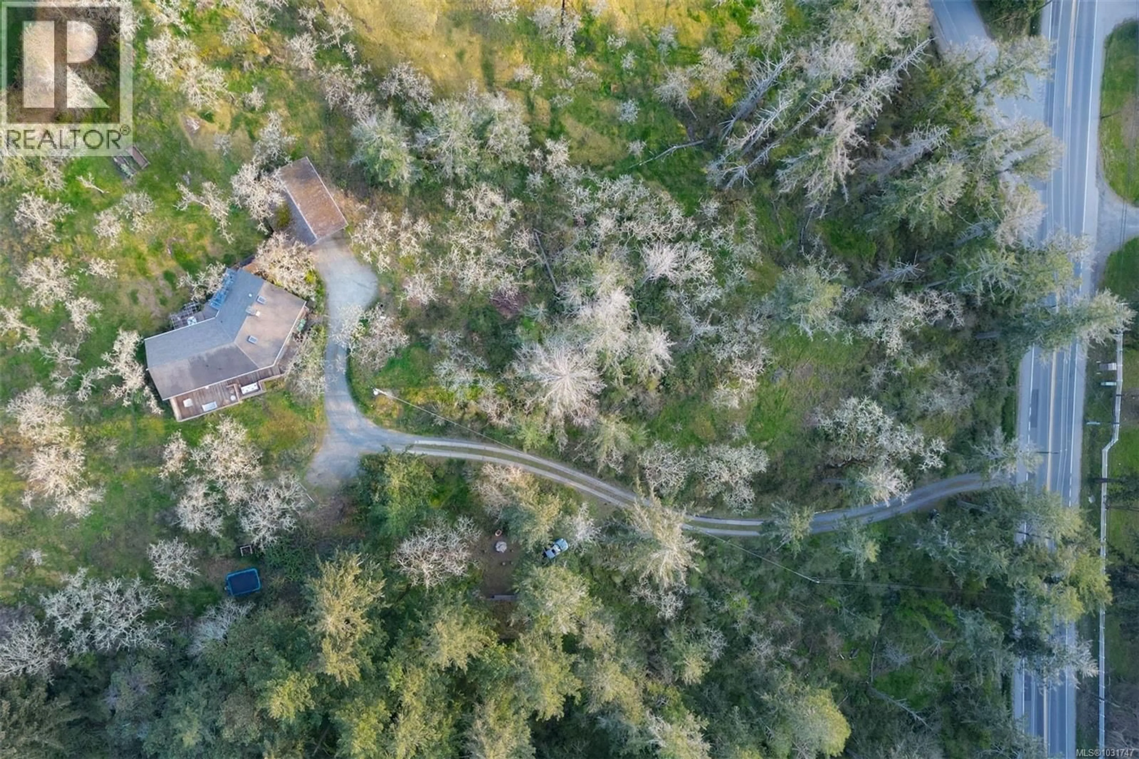 A pic from outside/outdoor area/front of a property/back of a property/a pic from drone, forest/trees view for 6587 WEST SAANICH ROAD, Central Saanich British Columbia V8M1W8