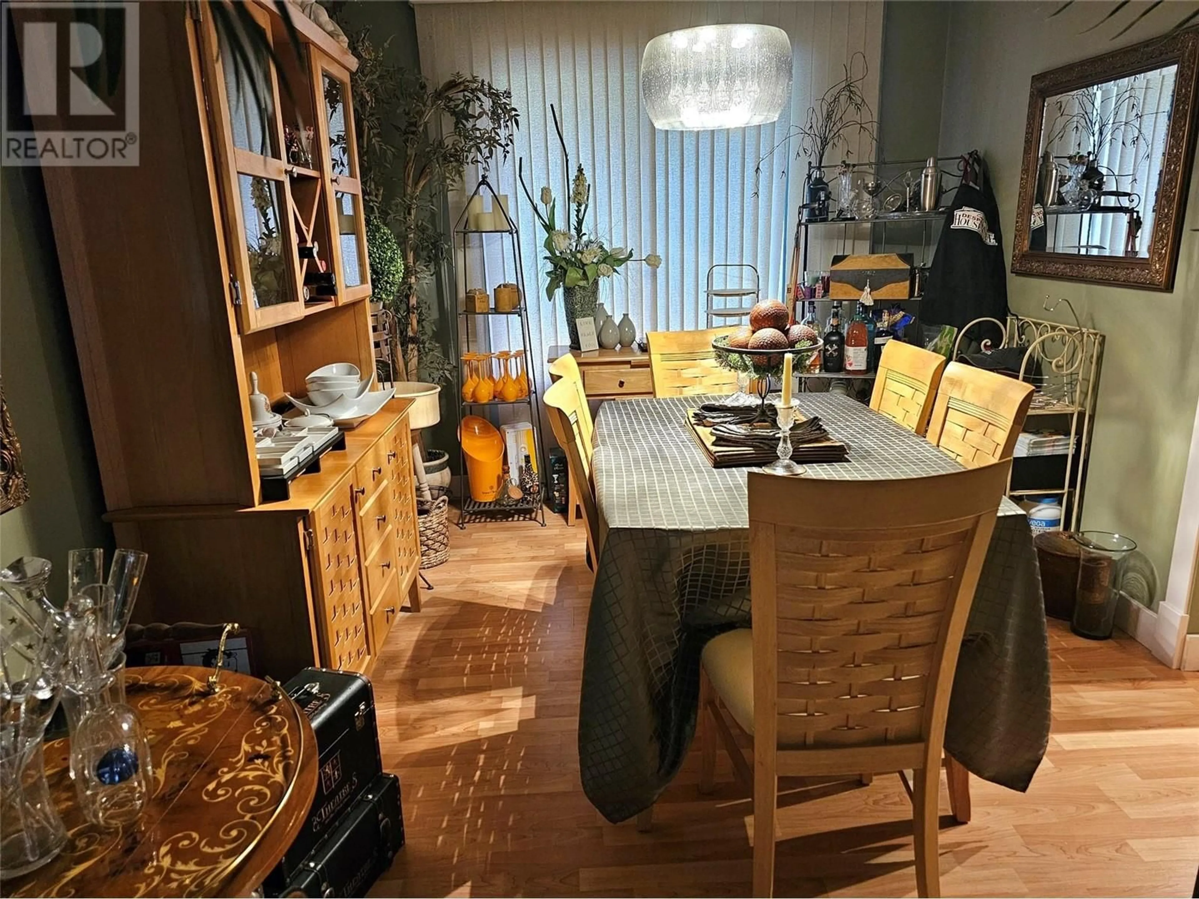 Dining room, wood floors, cottage for 599 Clifton Road, Kelowna British Columbia V1V1A6