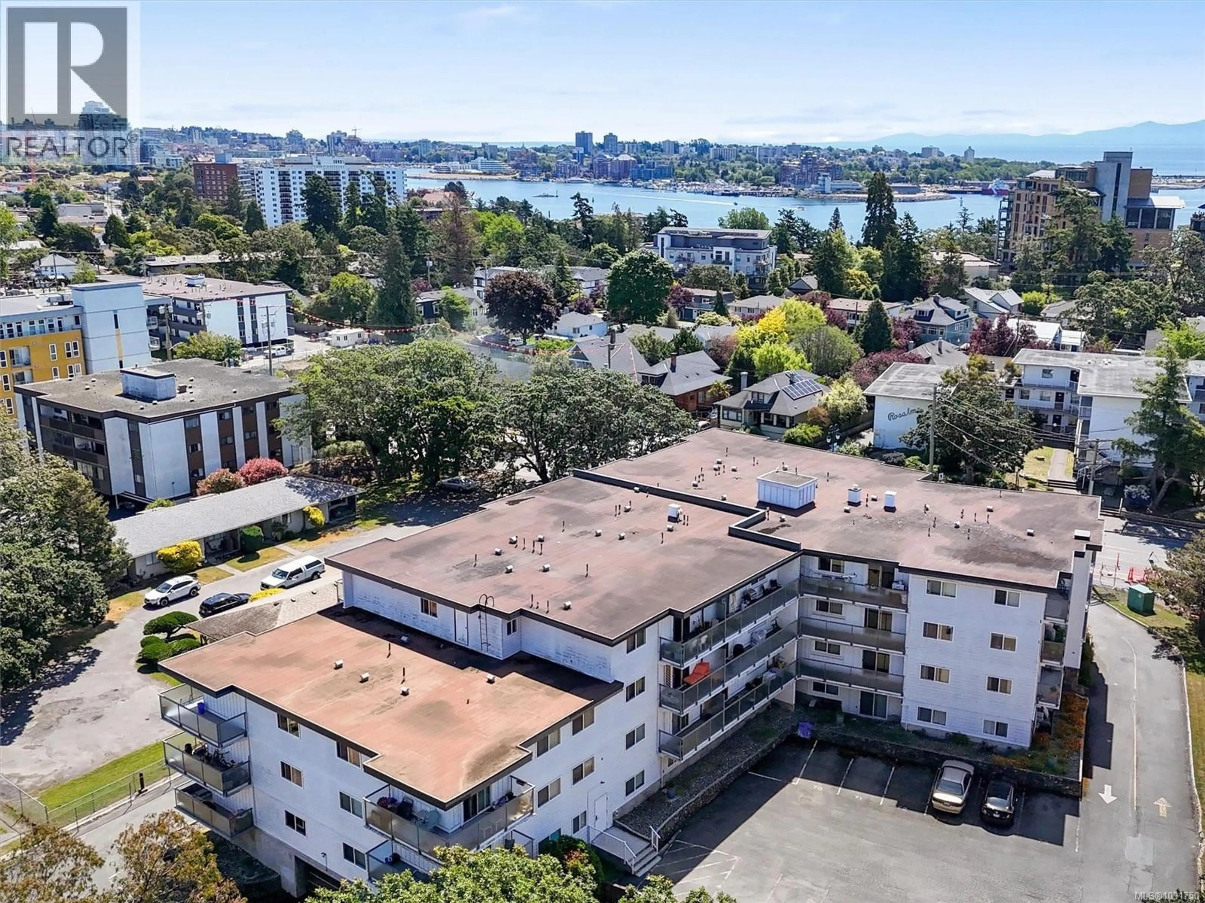 A pic from outside/outdoor area/front of a property/back of a property/a pic from drone, water/lake/river/ocean view for 207 - 848 ESQUIMALT ROAD, Esquimalt British Columbia V9A6W9