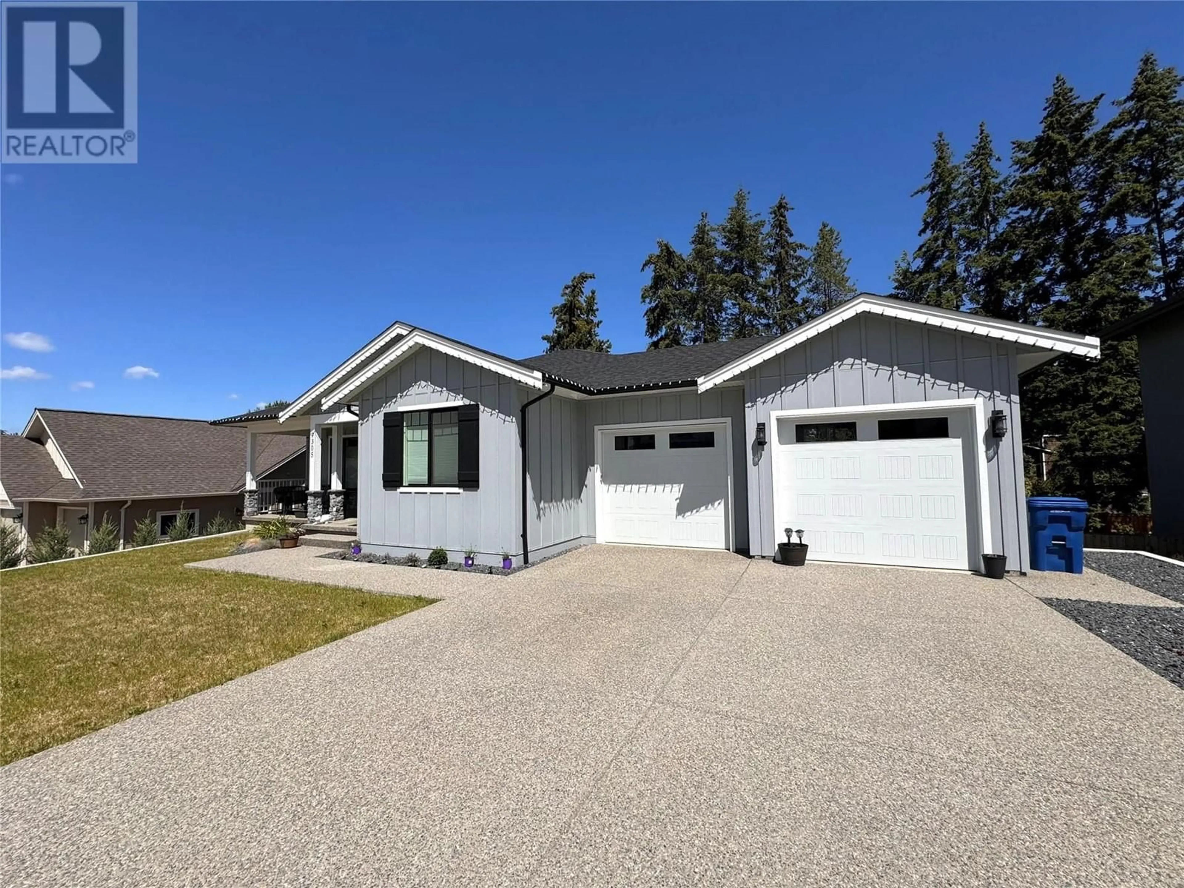 Home with vinyl exterior material for 9305 Elm Drive, Coldstream British Columbia V1B0A7