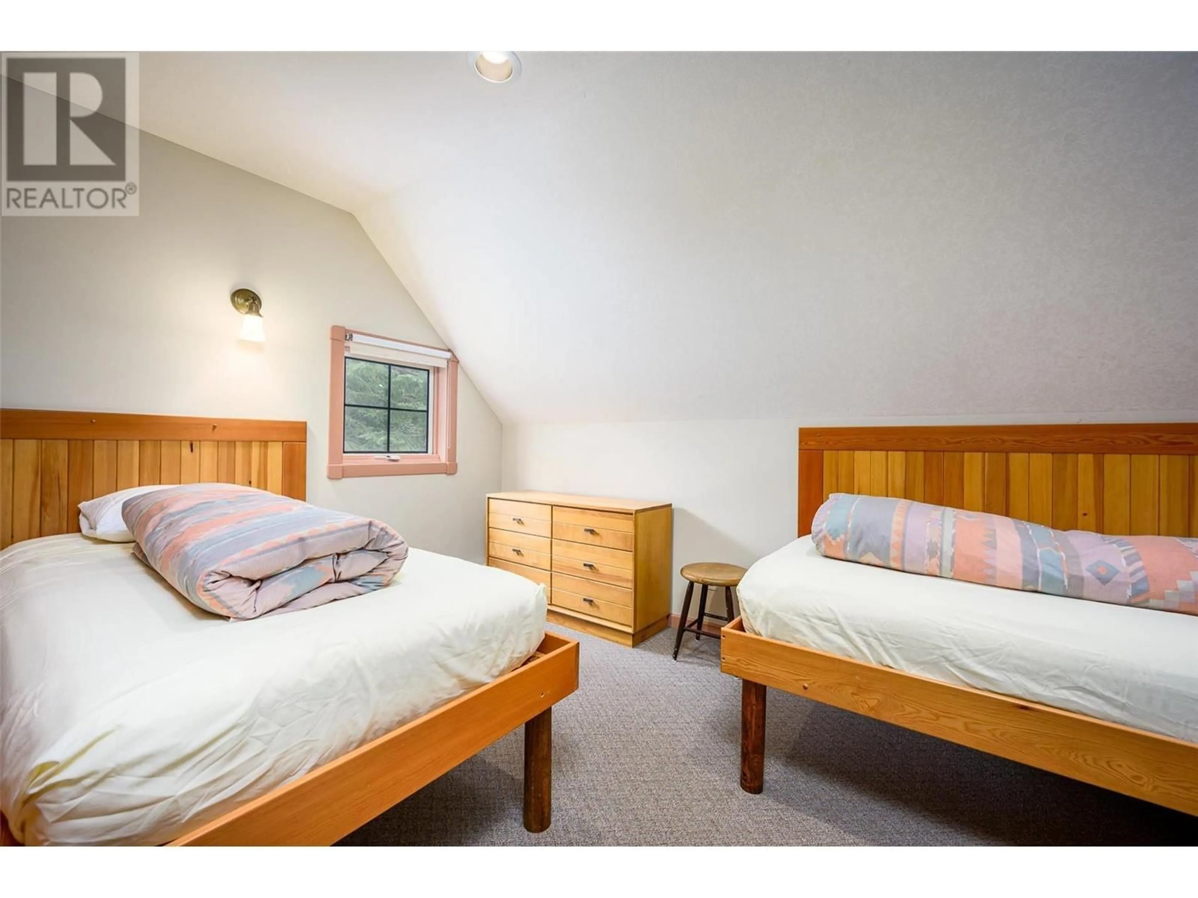 Bedroom with bed, unknown for 205 MONASHEE ROAD, Silver Star British Columbia V1B3M1