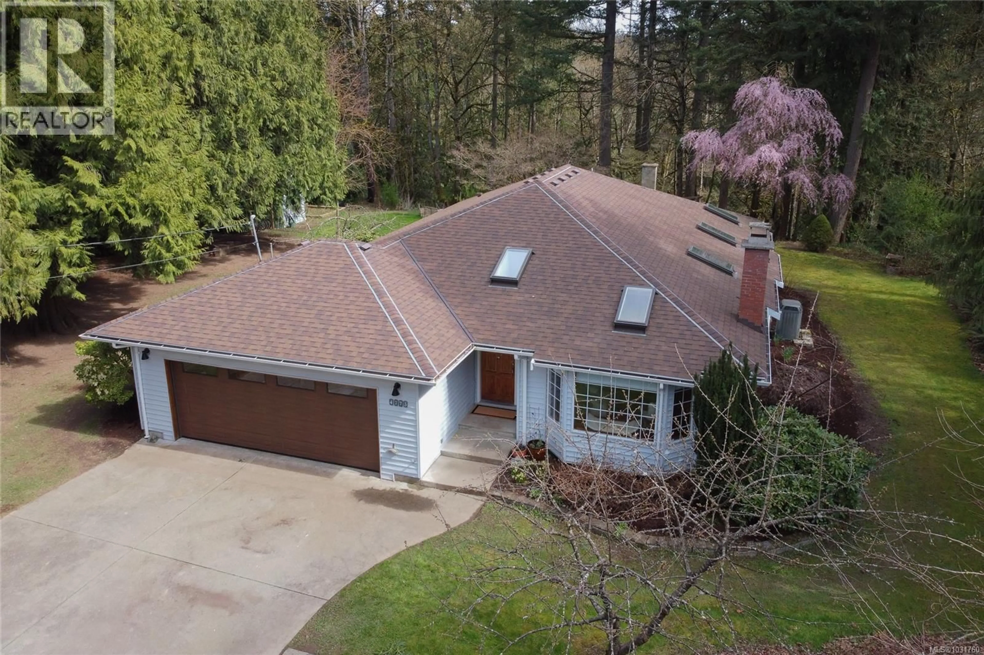 A pic from outside/outdoor area/front of a property/back of a property/a pic from drone, street for 4773 FAIRBRIDGE DRIVE, Duncan British Columbia V9L6N9