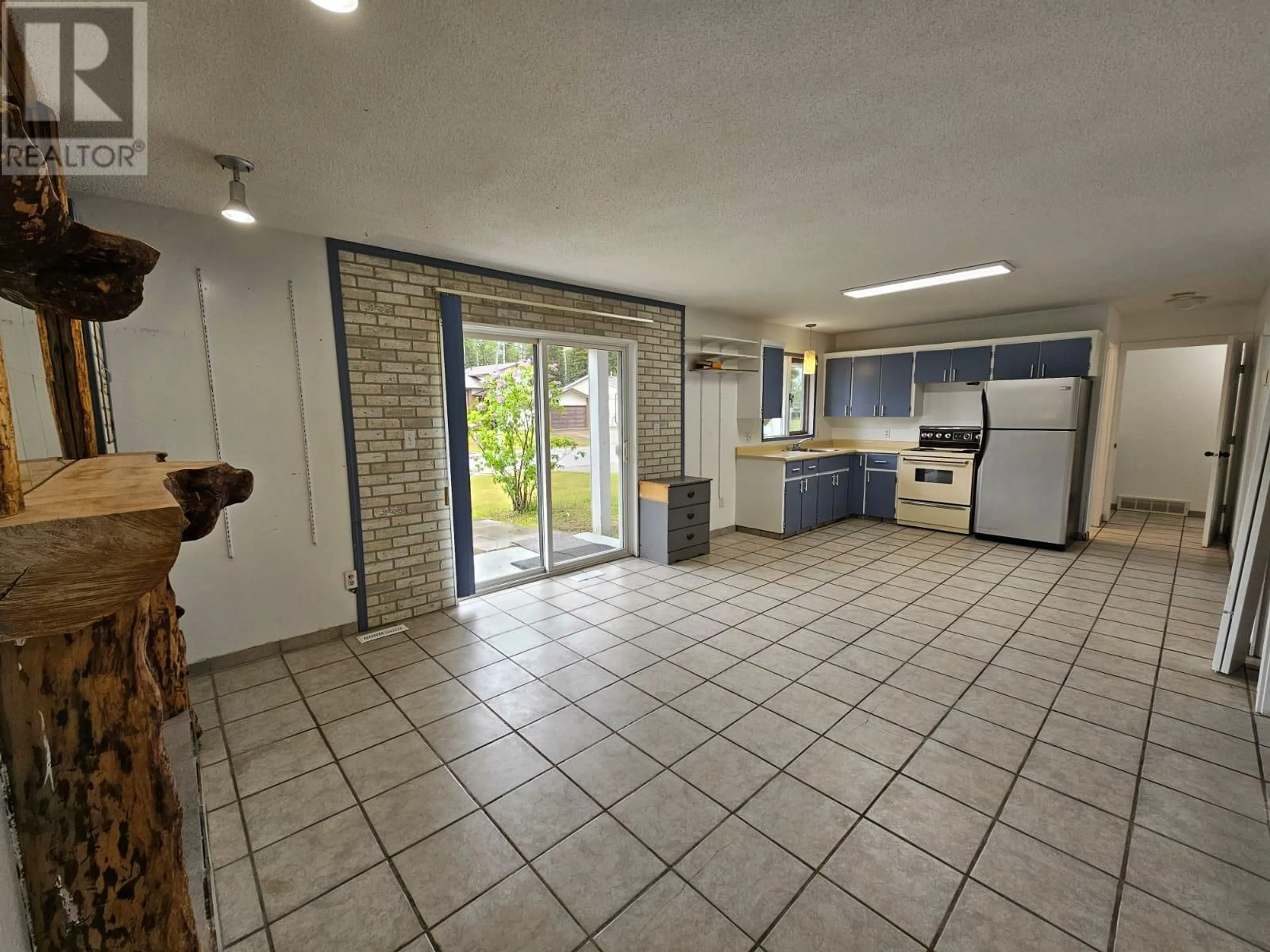 Kitchen, cement floor, cottage for 219 COTTONWOOD Crescent, Tumbler Ridge British Columbia V0C2W0