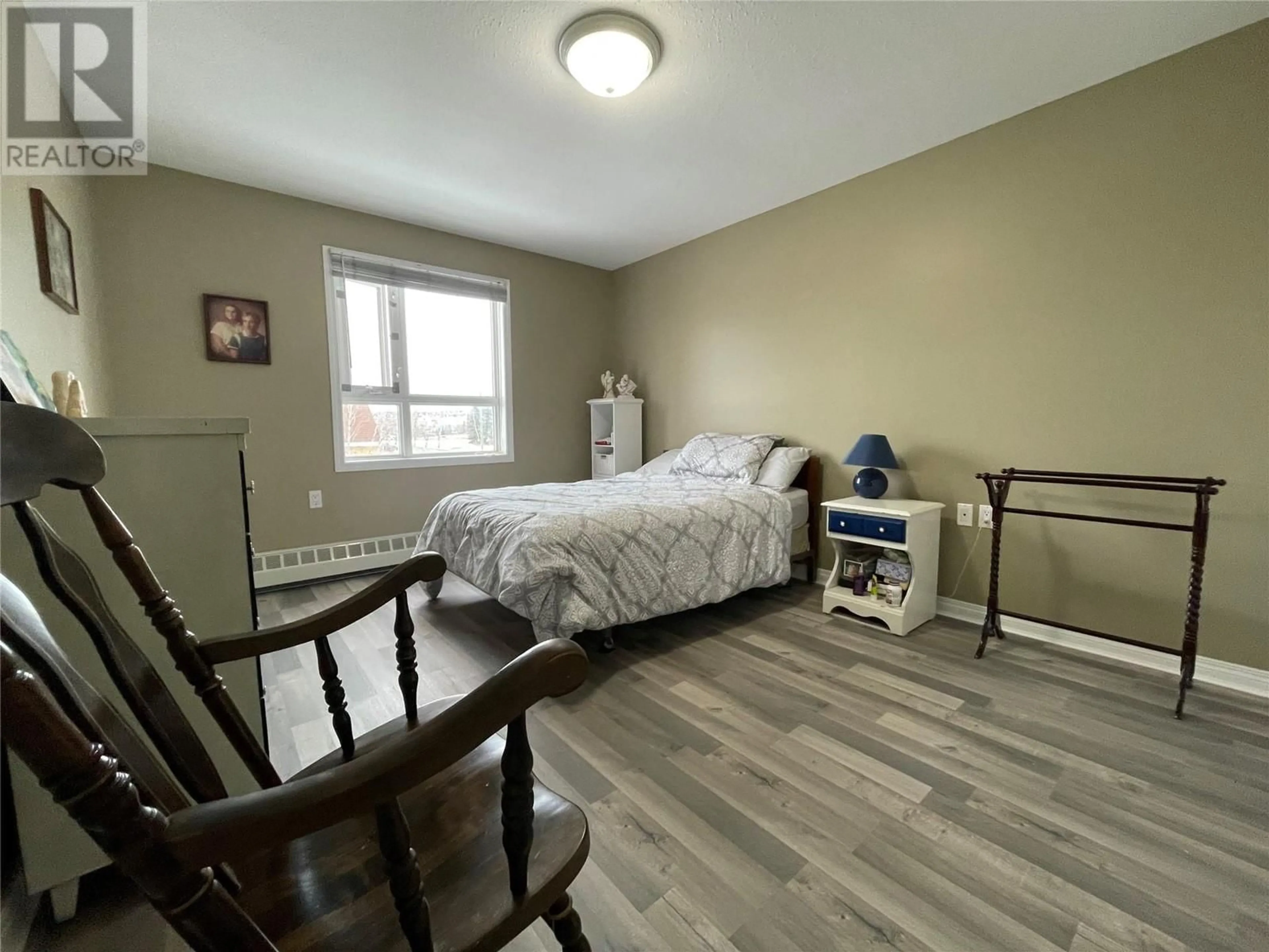 A pic of a room, wood floors for 11001 13 Street Unit# 203, Dawson Creek British Columbia V1G4Z8