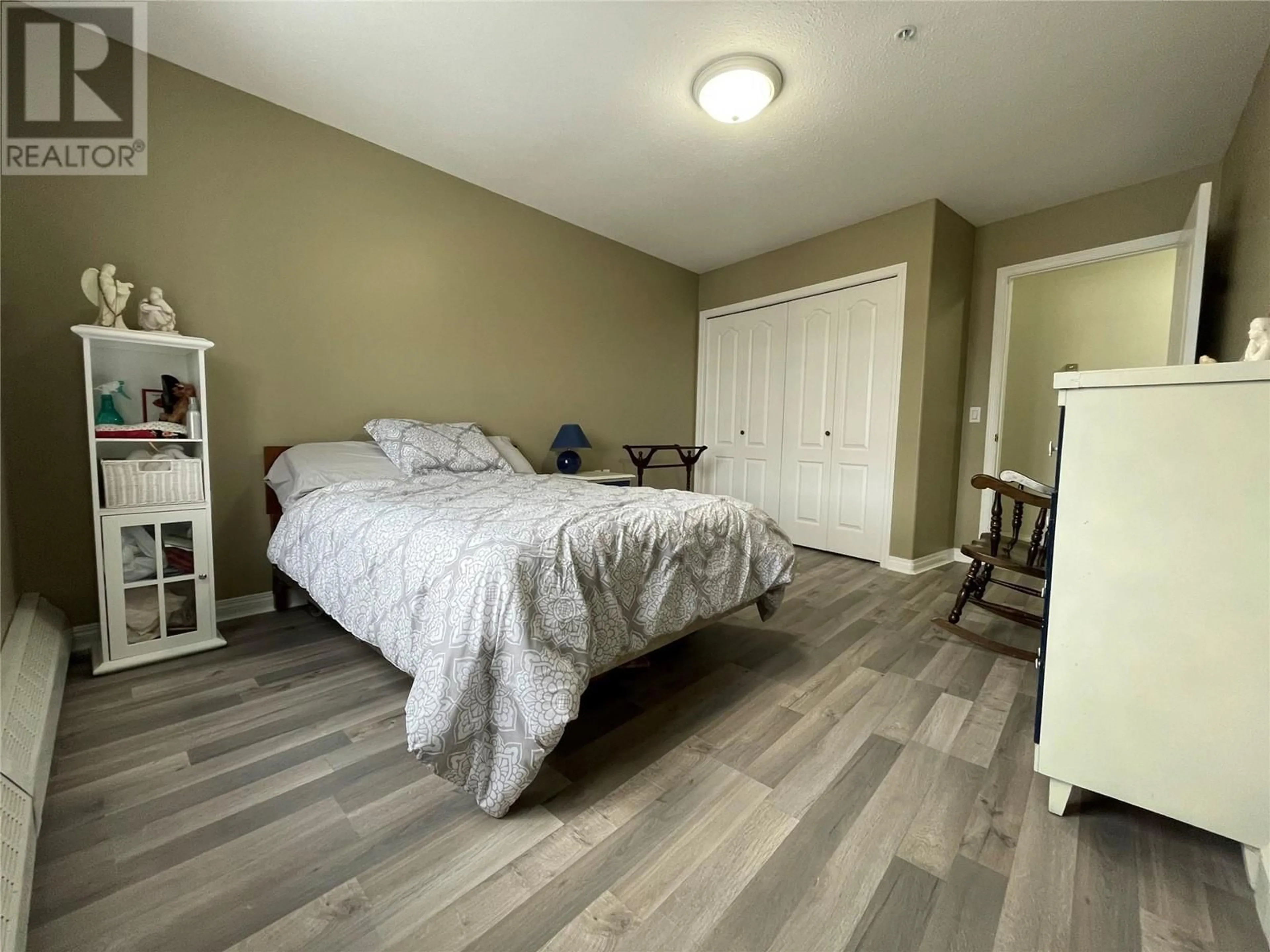 A pic of a room, wood floors for 11001 13 Street Unit# 203, Dawson Creek British Columbia V1G4Z8