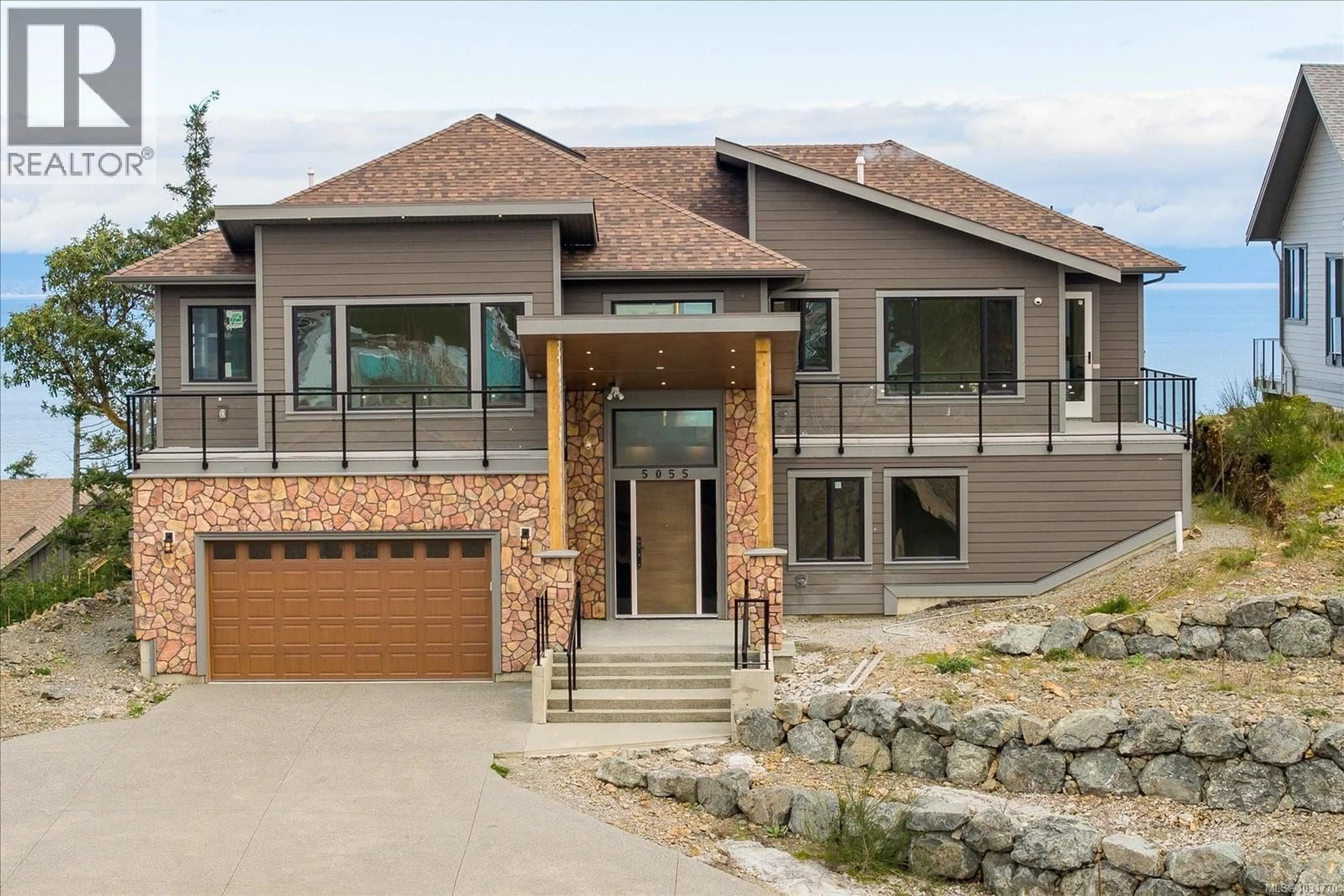 Home with brick exterior material, mountain view for 5055 BANNING COURT, Nanaimo British Columbia V9V0A2