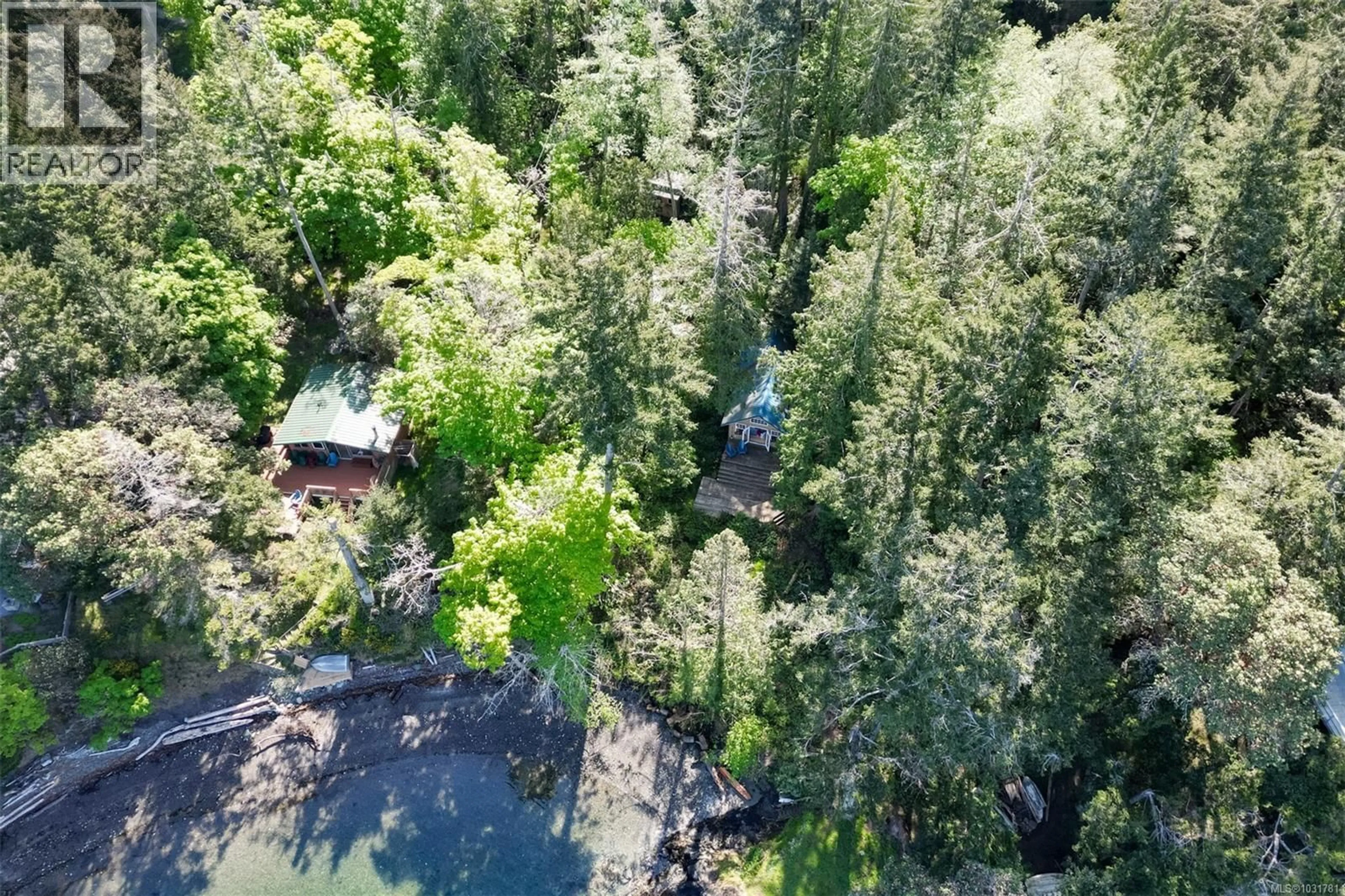 A pic from outside/outdoor area/front of a property/back of a property/a pic from drone, forest/trees view for 90 MCKENZIE CRESCENT, Piers Island British Columbia V8L5Y7