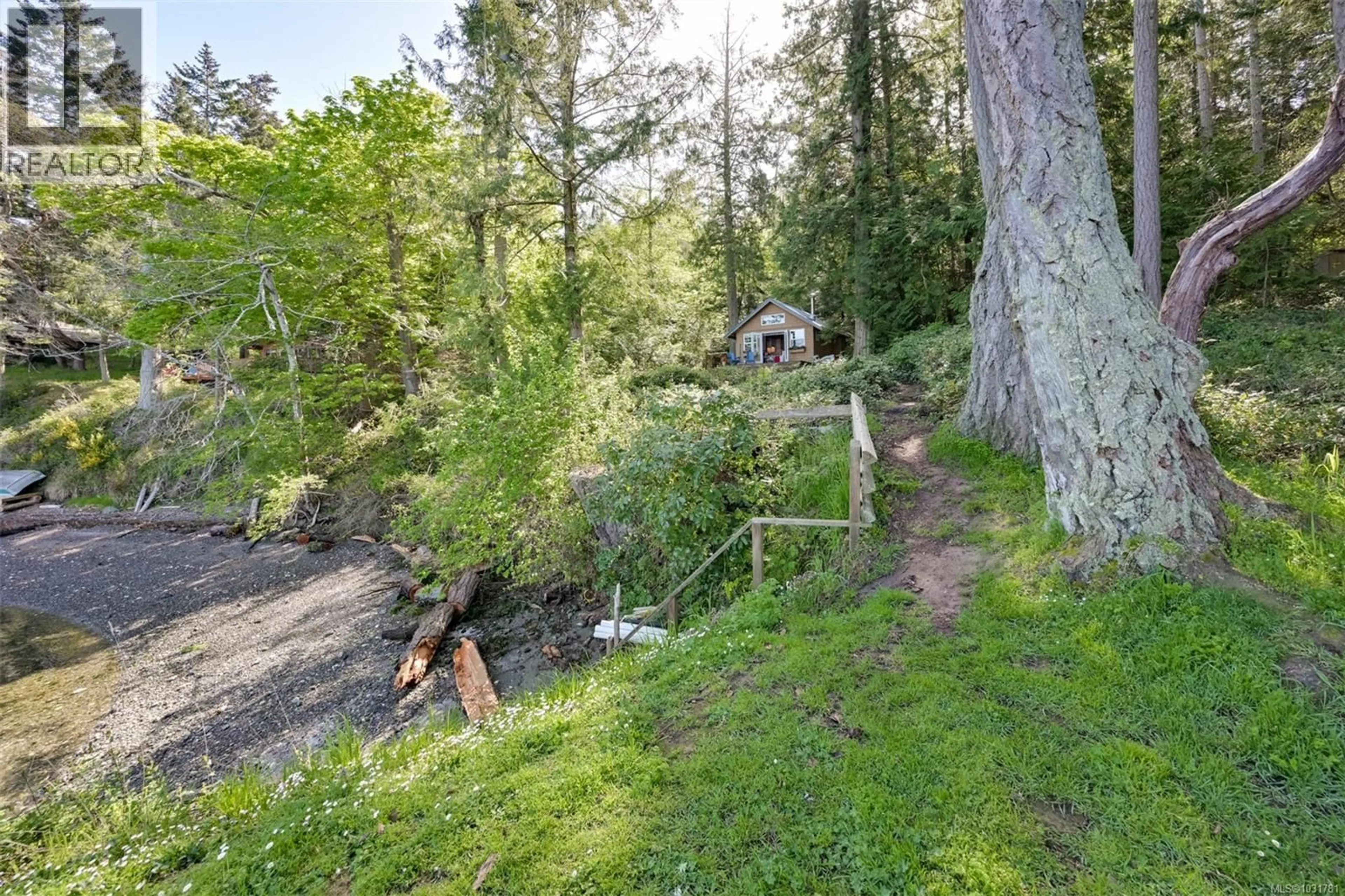 A pic from outside/outdoor area/front of a property/back of a property/a pic from drone, forest/trees view for 90 MCKENZIE CRESCENT, Piers Island British Columbia V8L5Y7
