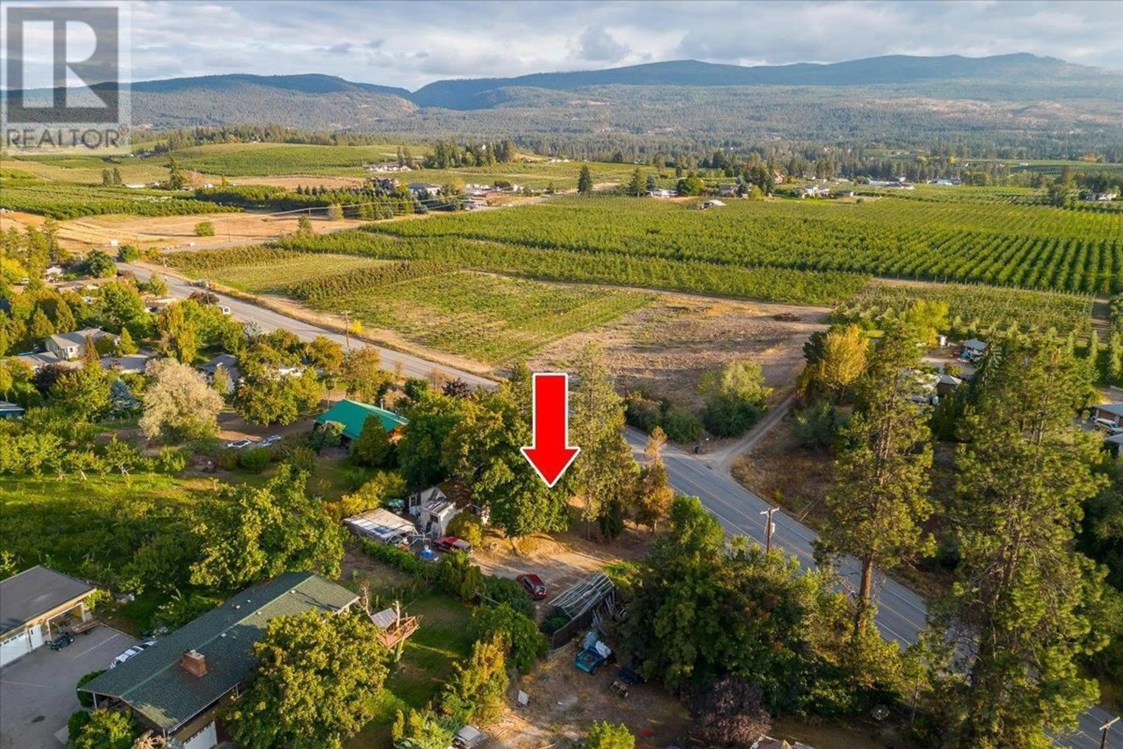A pic from outside/outdoor area/front of a property/back of a property/a pic from drone, mountain view for 3122 MCCULLOCH ROAD, Kelowna British Columbia V1W4G6