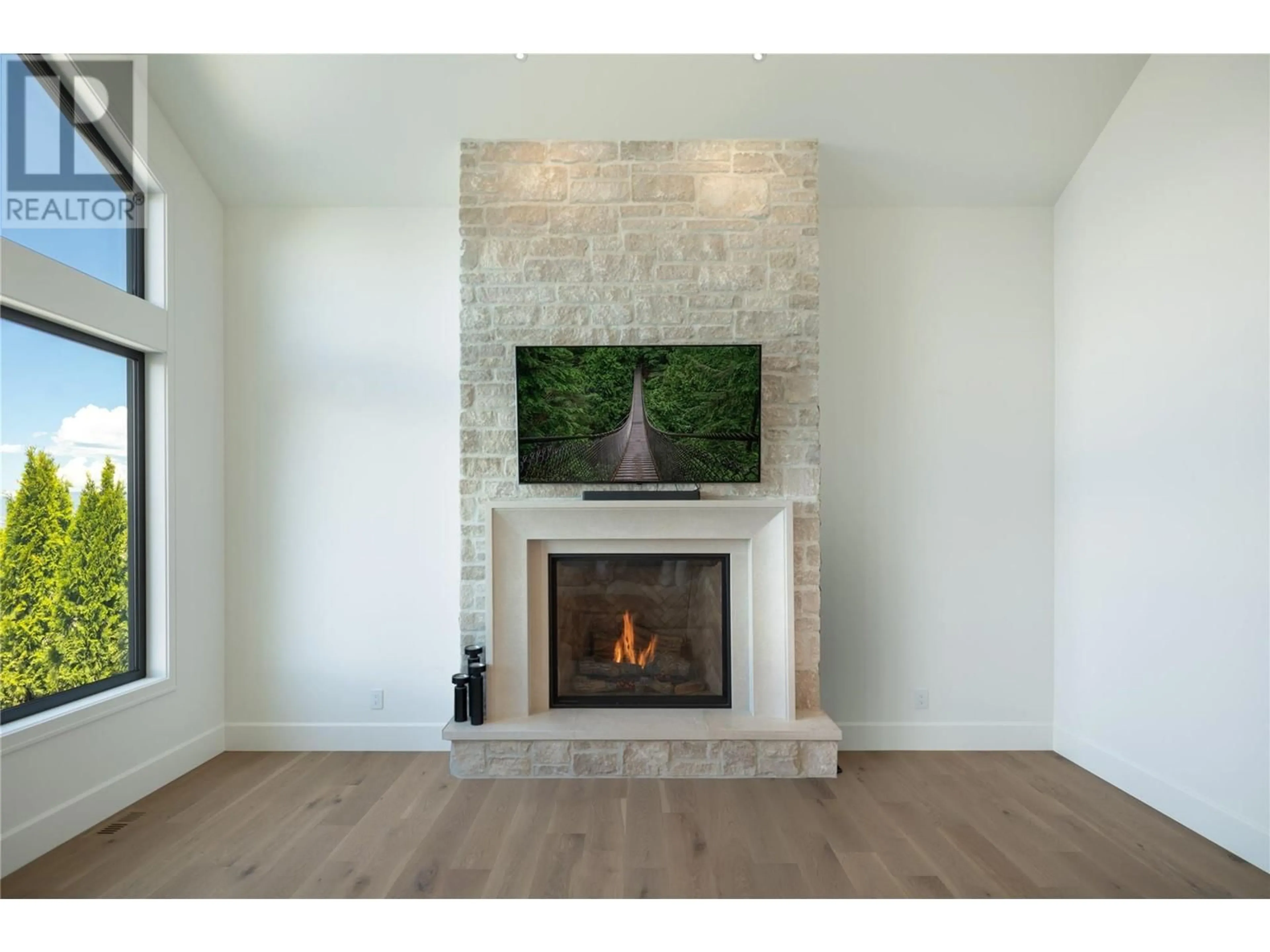 Living room, wood floors for 1440 Hill Spring Place, Kelowna British Columbia V1W0E5