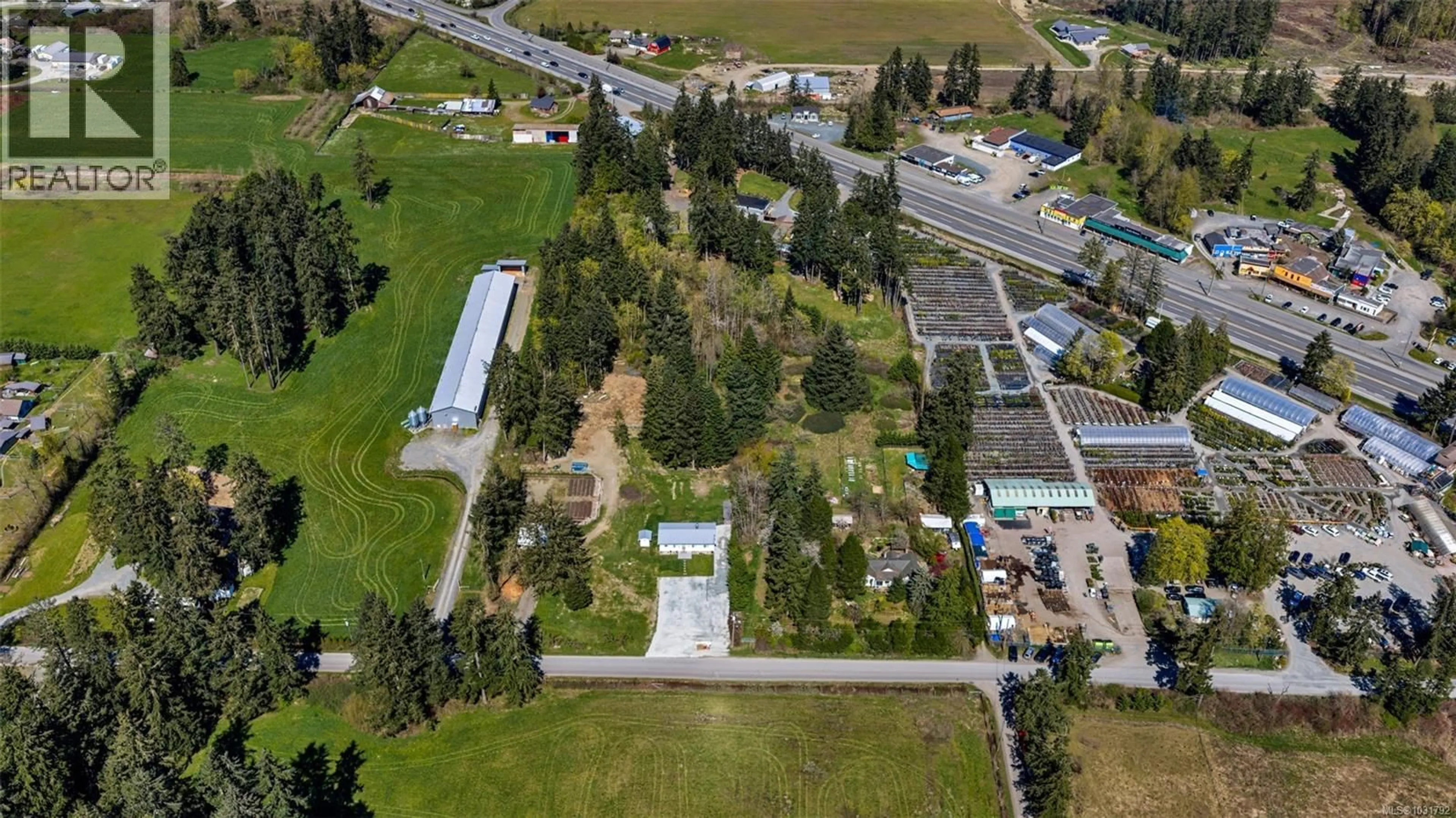 A pic from outside/outdoor area/front of a property/back of a property/a pic from drone, street for 2255 PHIPPS ROAD, Duncan British Columbia V9L6L2