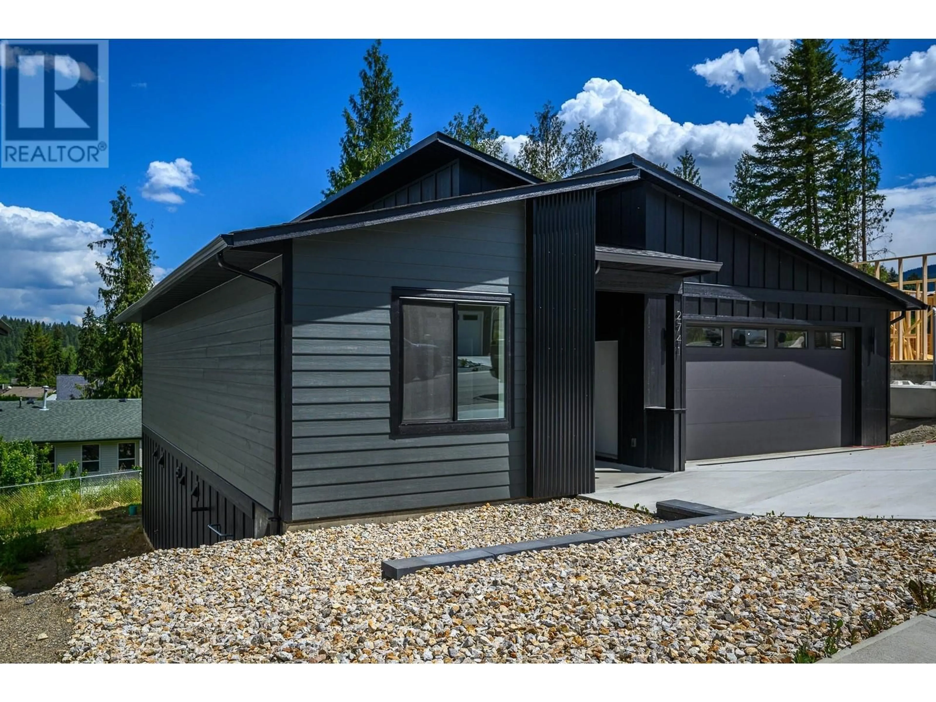 Home with vinyl exterior material for 2741 Cedar Ridge Street, Lumby British Columbia V0E2G5