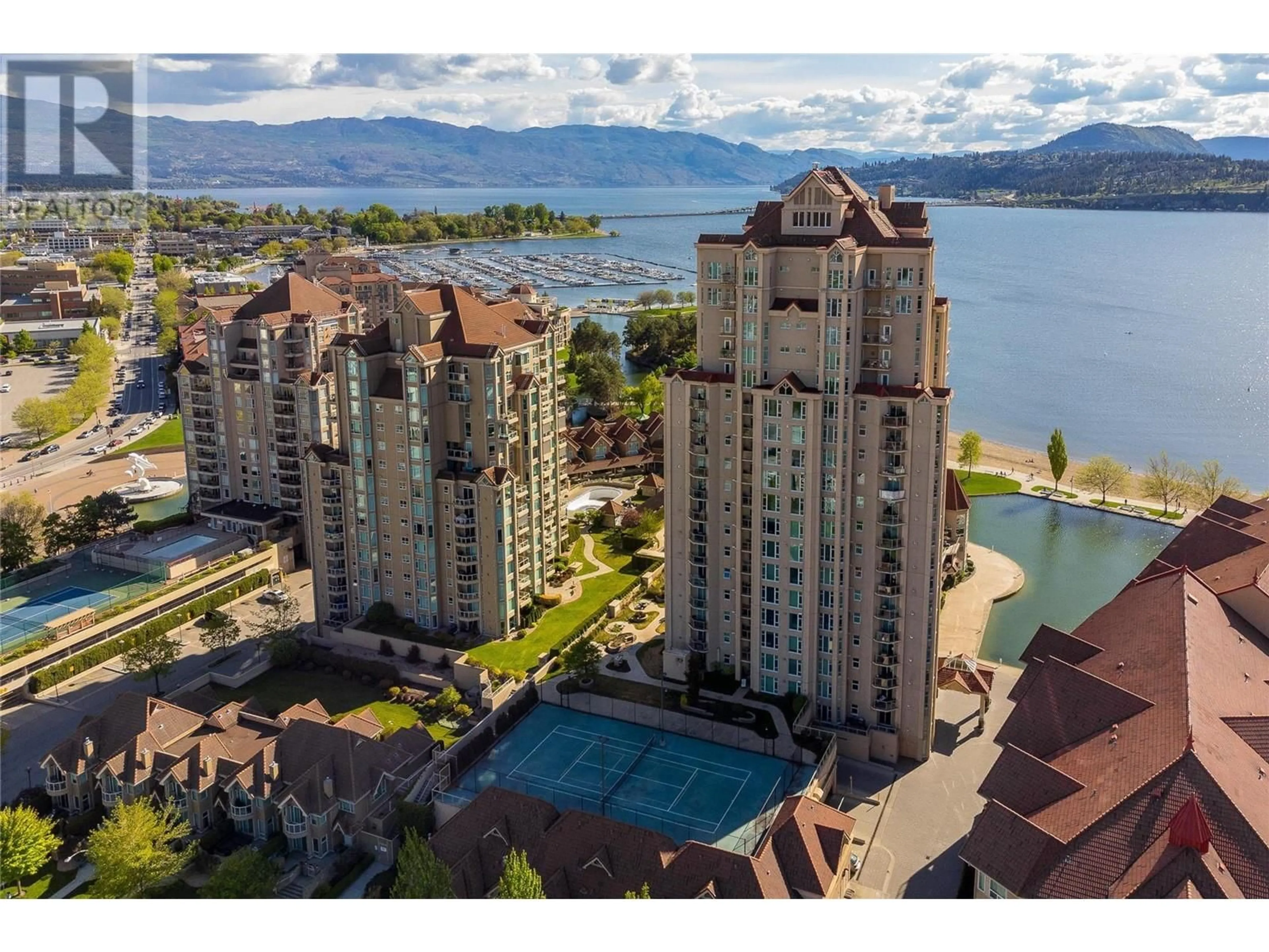 A pic from outside/outdoor area/front of a property/back of a property/a pic from drone, water/lake/river/ocean view for 1202 - 1128 SUNSET DRIVE, Kelowna British Columbia V1Y9W7