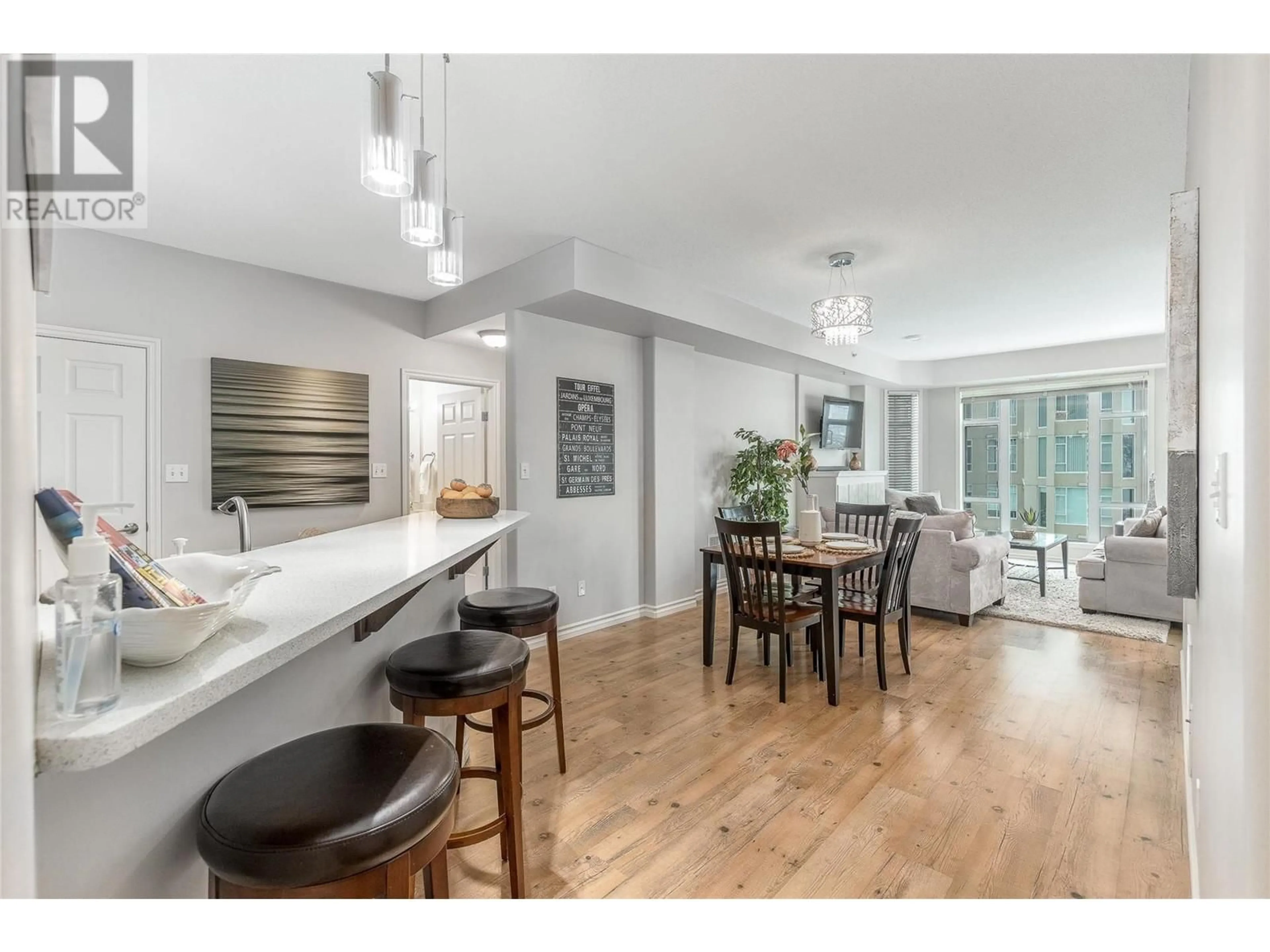 Open concept kitchen, wood/laminate floor for 1202 - 1128 SUNSET DRIVE, Kelowna British Columbia V1Y9W7