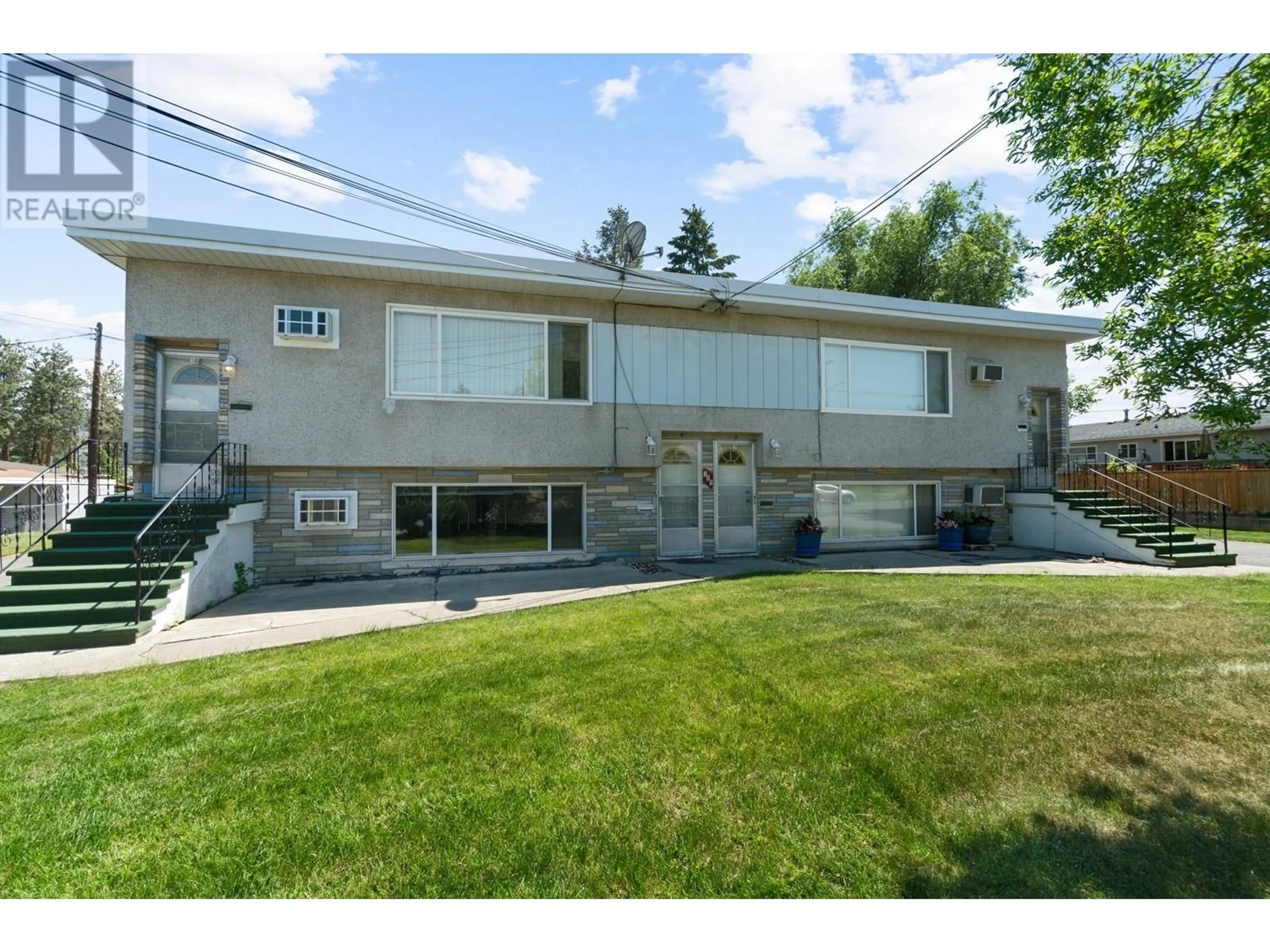 A pic from exterior of the house or condo for 305 Cambie Road, Kelowna British Columbia V1X3J1