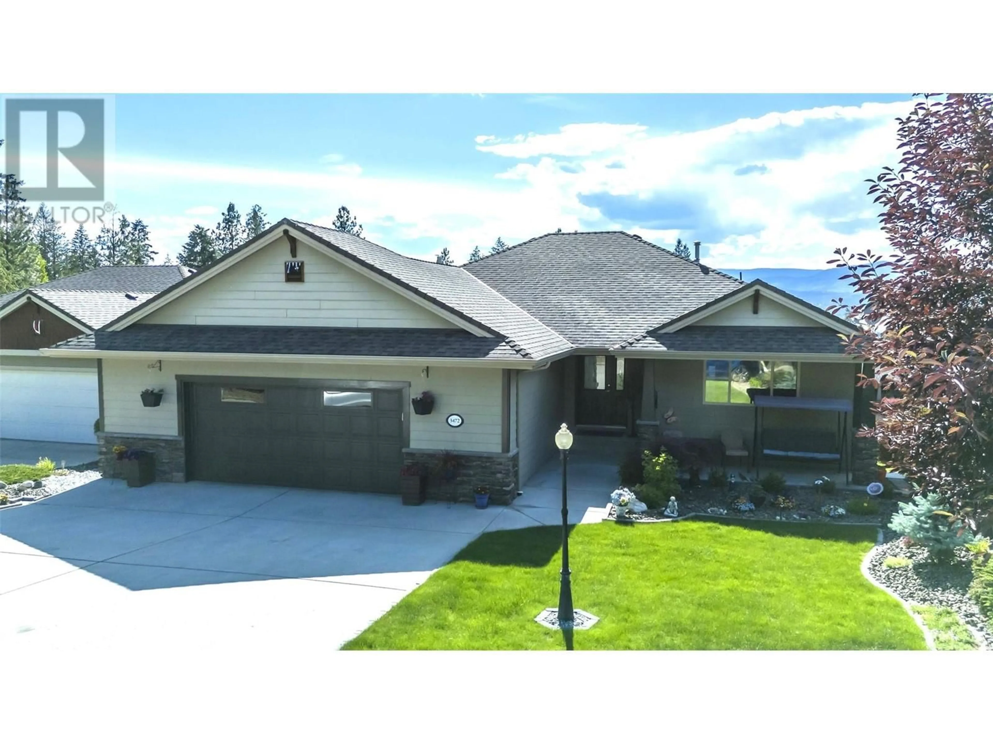 Frontside or backside of a home, the street view for 3472 Camelback Drive, Kelowna British Columbia V1X8A7