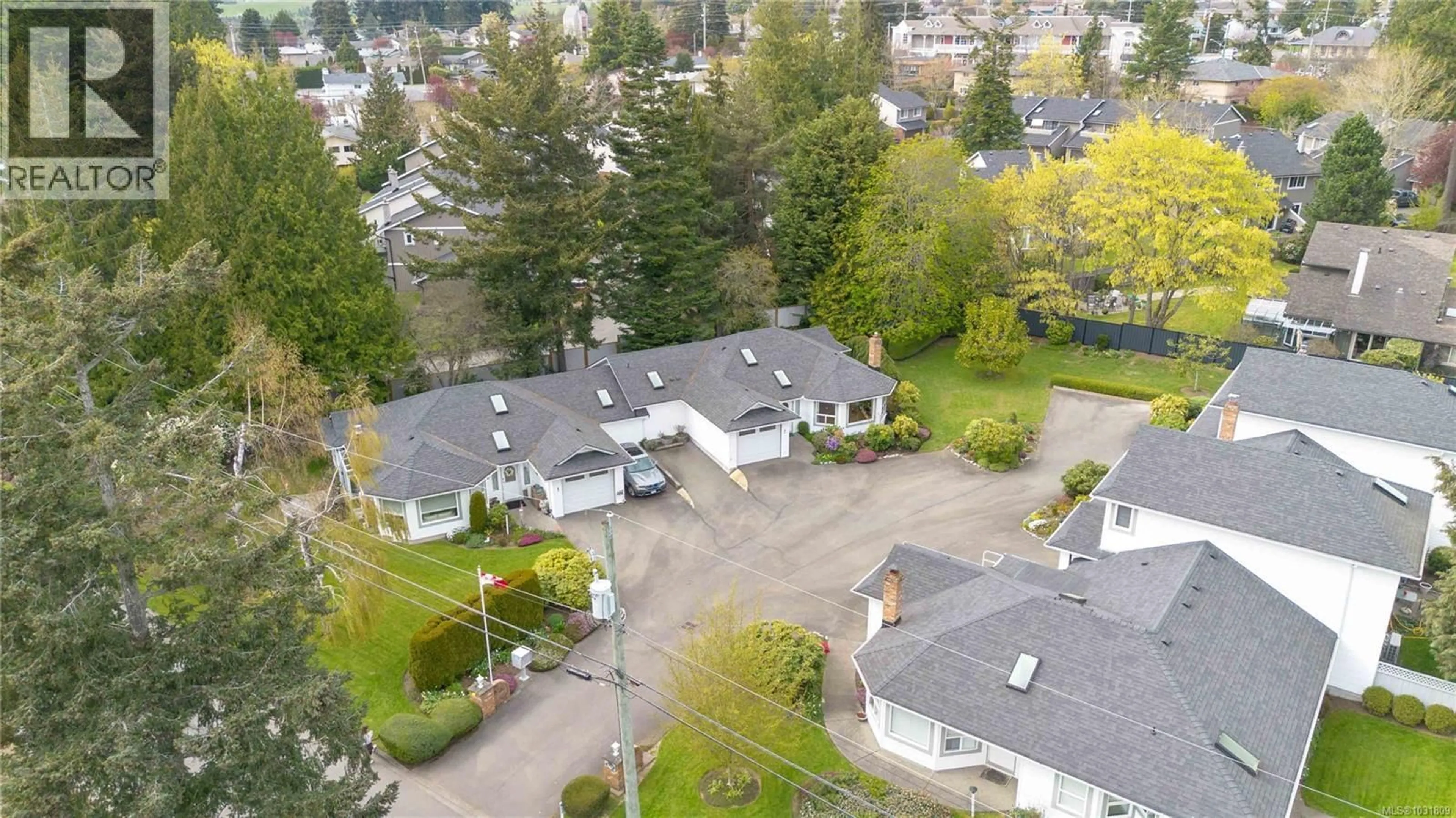 A pic from outside/outdoor area/front of a property/back of a property/a pic from drone, street for 2 - 1968 CULTRA AVENUE, Central Saanich British Columbia V8M2J8