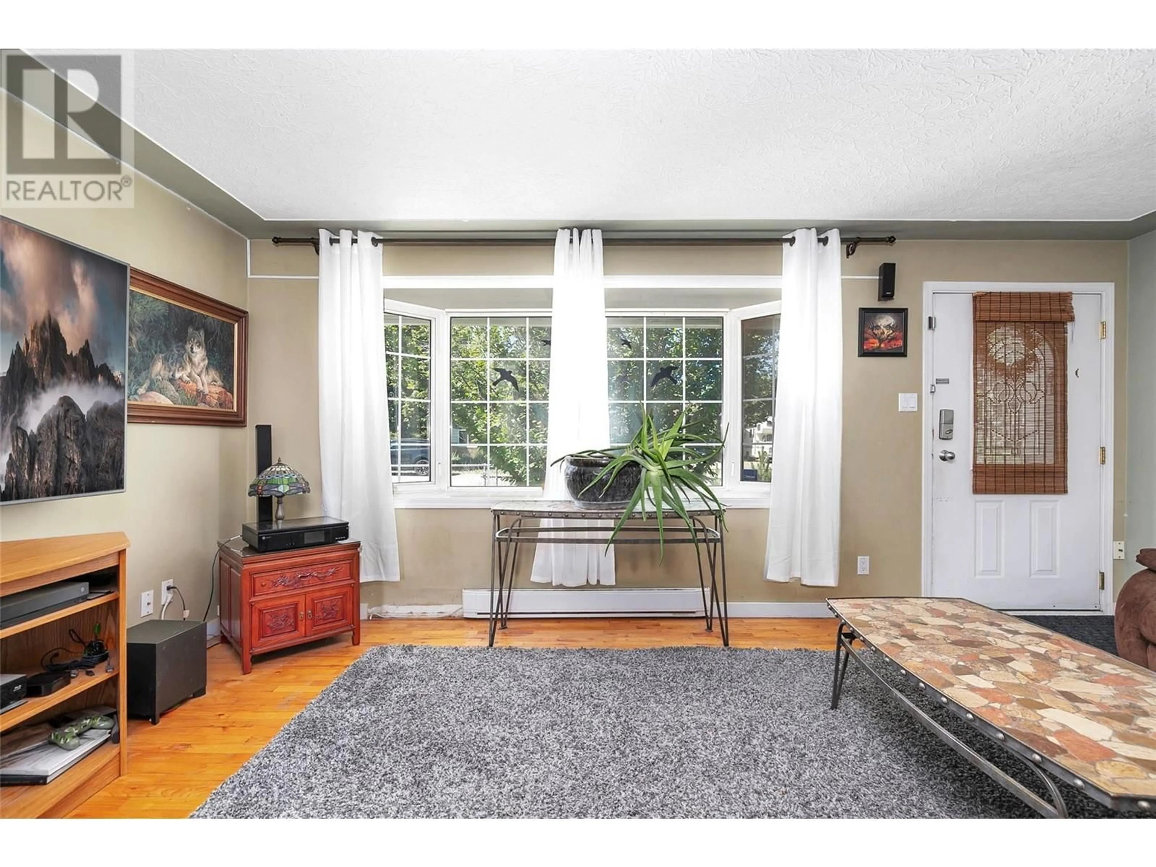 Living room, wood floors for 155 Sadler Road, Kelowna British Columbia V1X2Y6