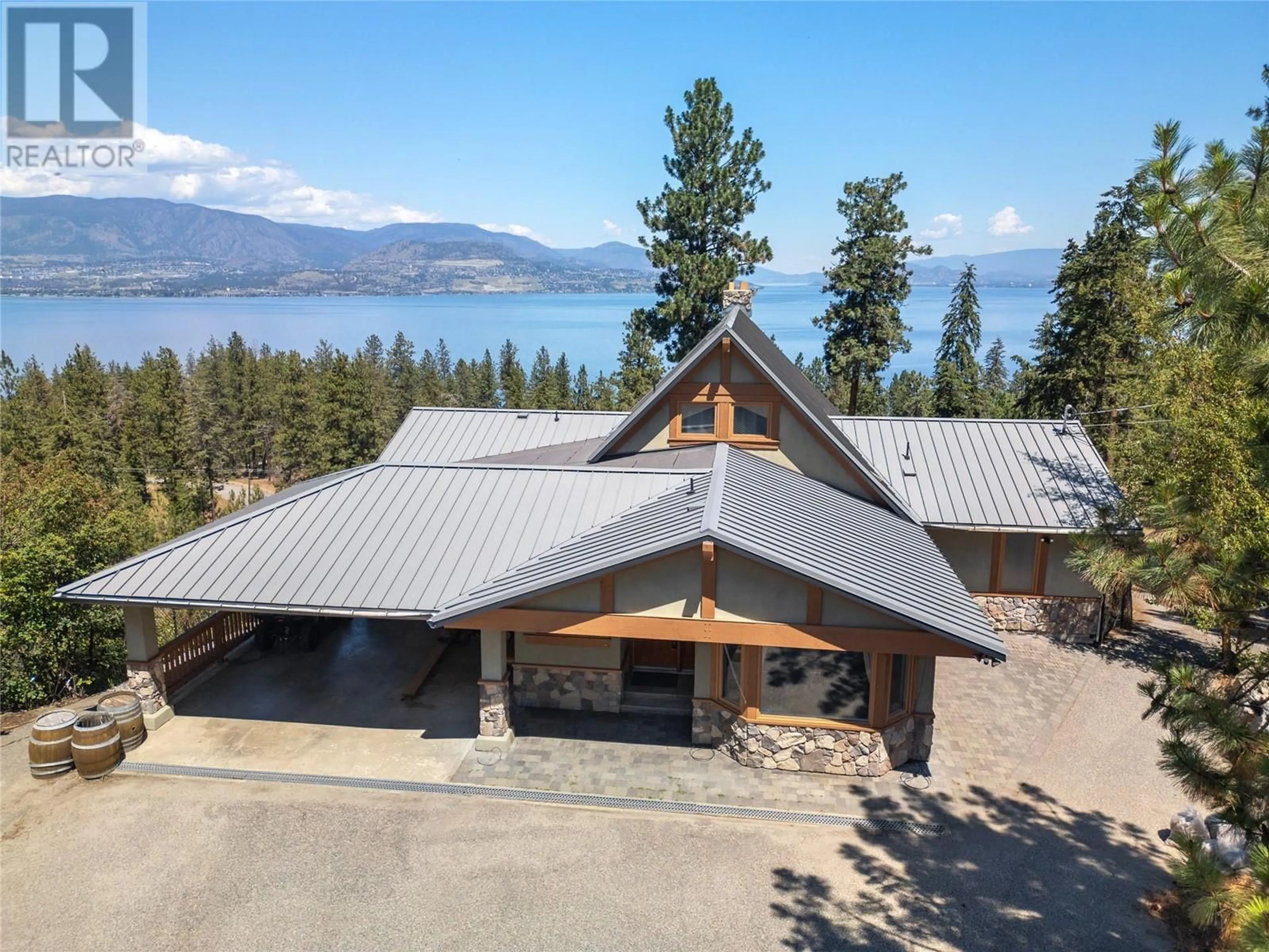 Frontside or backside of a home, cottage for 174 Rimrock Road, Kelowna British Columbia V1W4J6