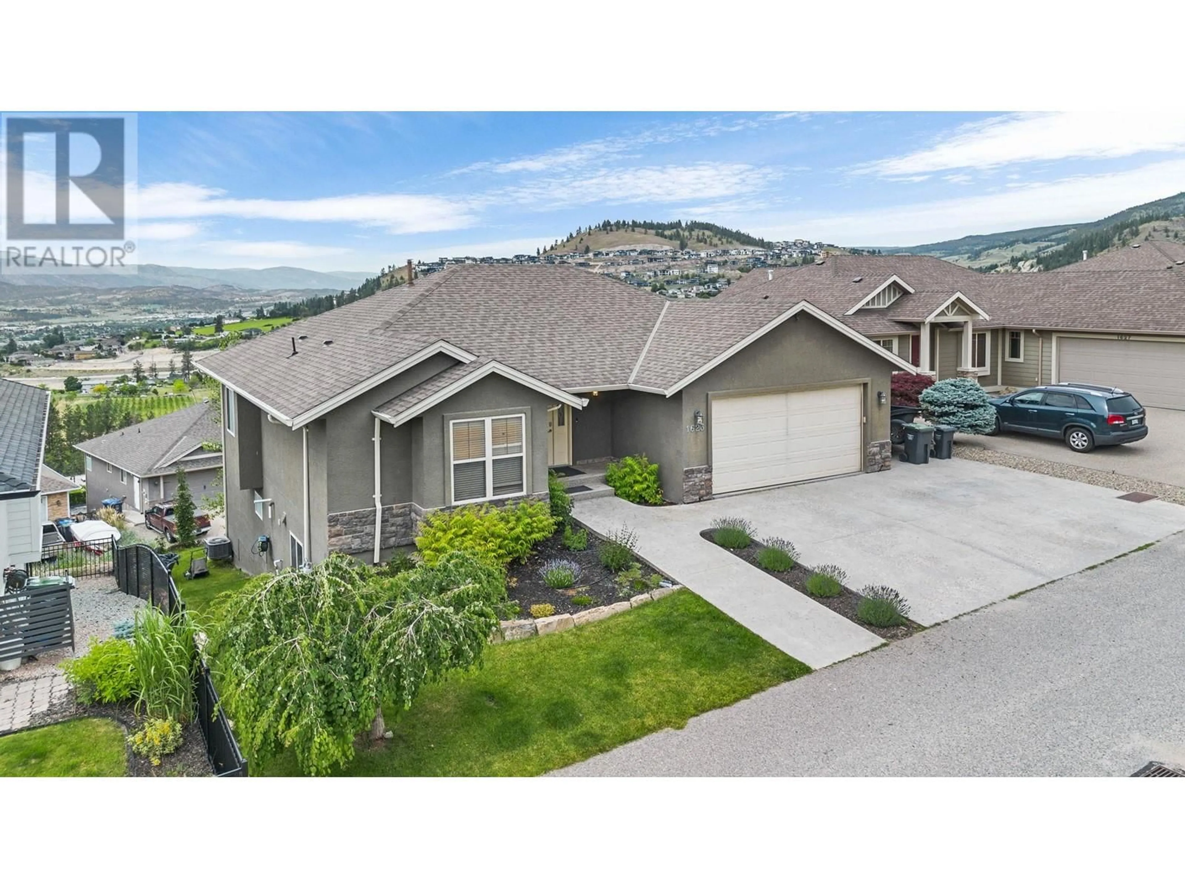 Frontside or backside of a home, cottage for 1623 Sunrise Road, Kelowna British Columbia V1P1N9