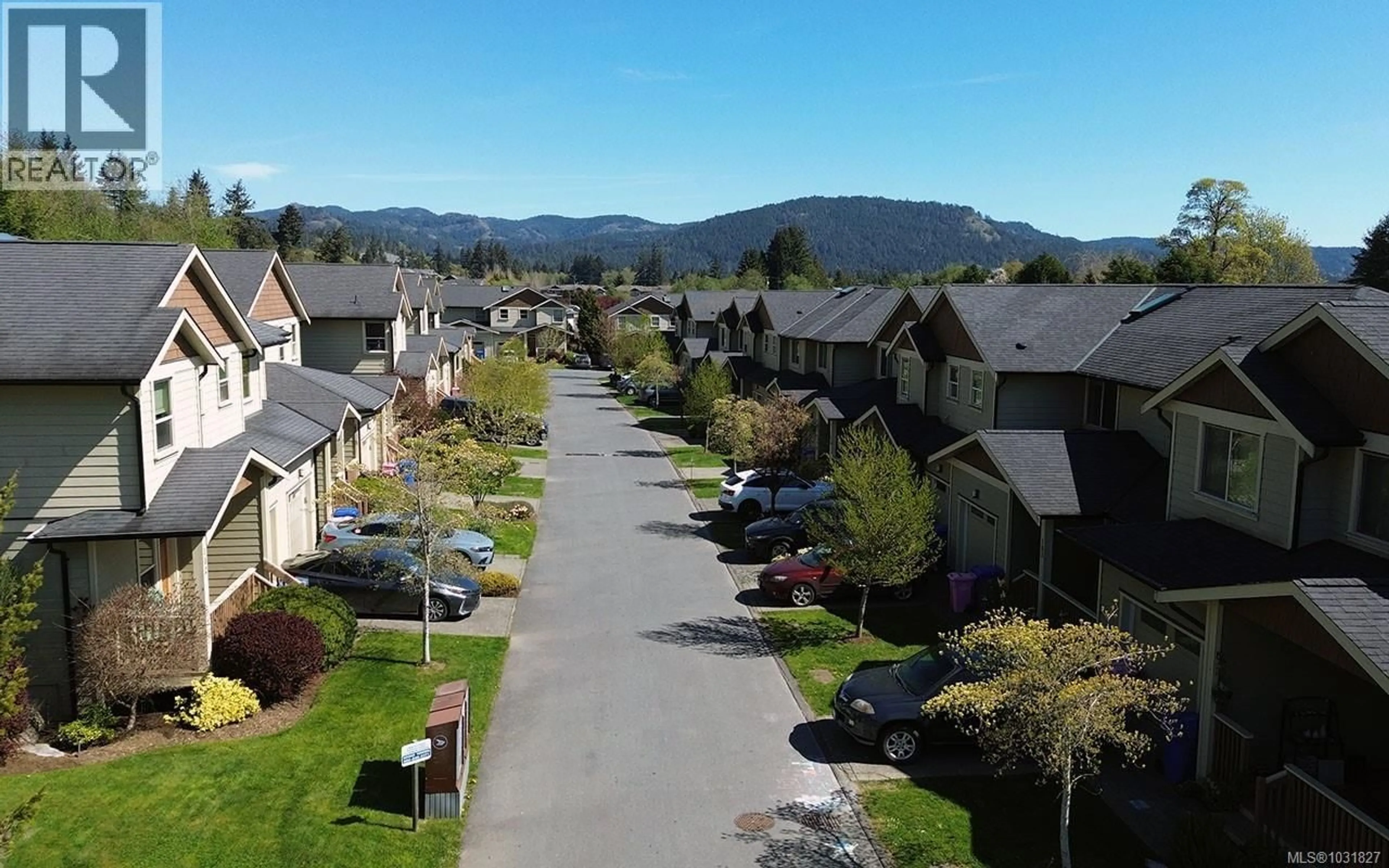 A pic from outside/outdoor area/front of a property/back of a property/a pic from drone, mountain view for 107 - 2253 TOWNSEND ROAD, Sooke British Columbia V9Z1M1