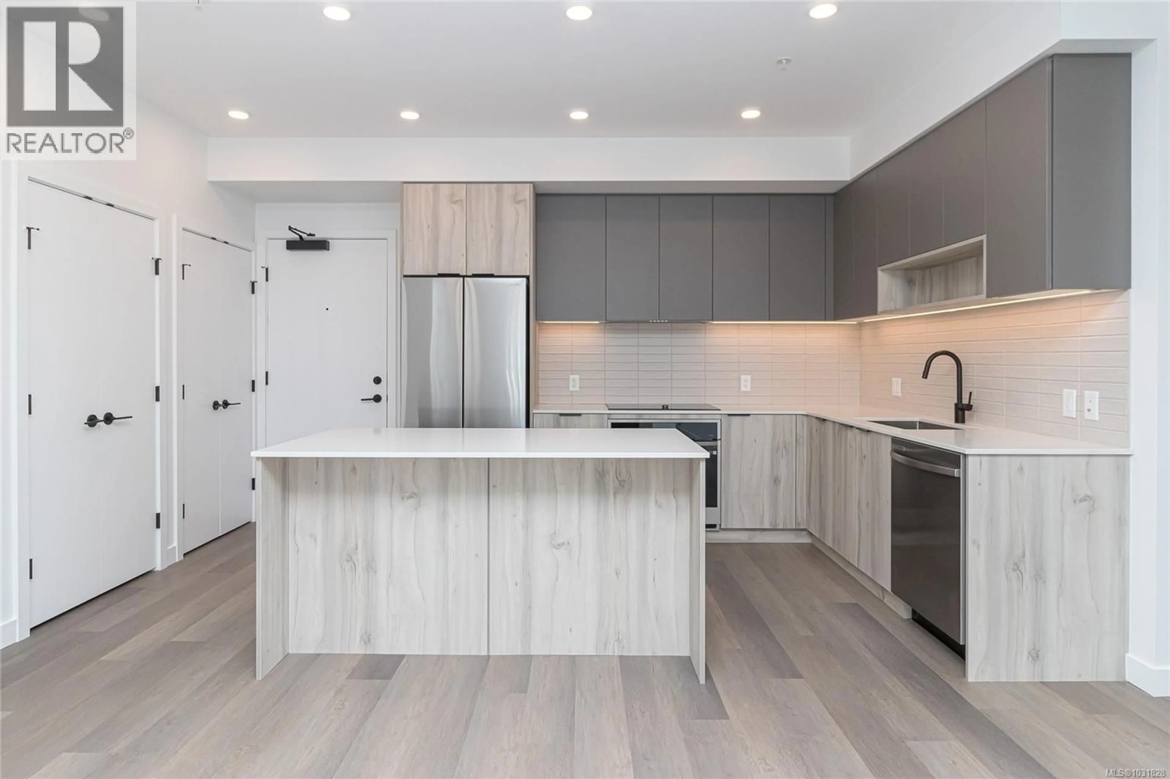 Open concept kitchen, unknown for 312 - 3564B RYDER HESJEDAL WAY, Colwood British Columbia V9C0V4