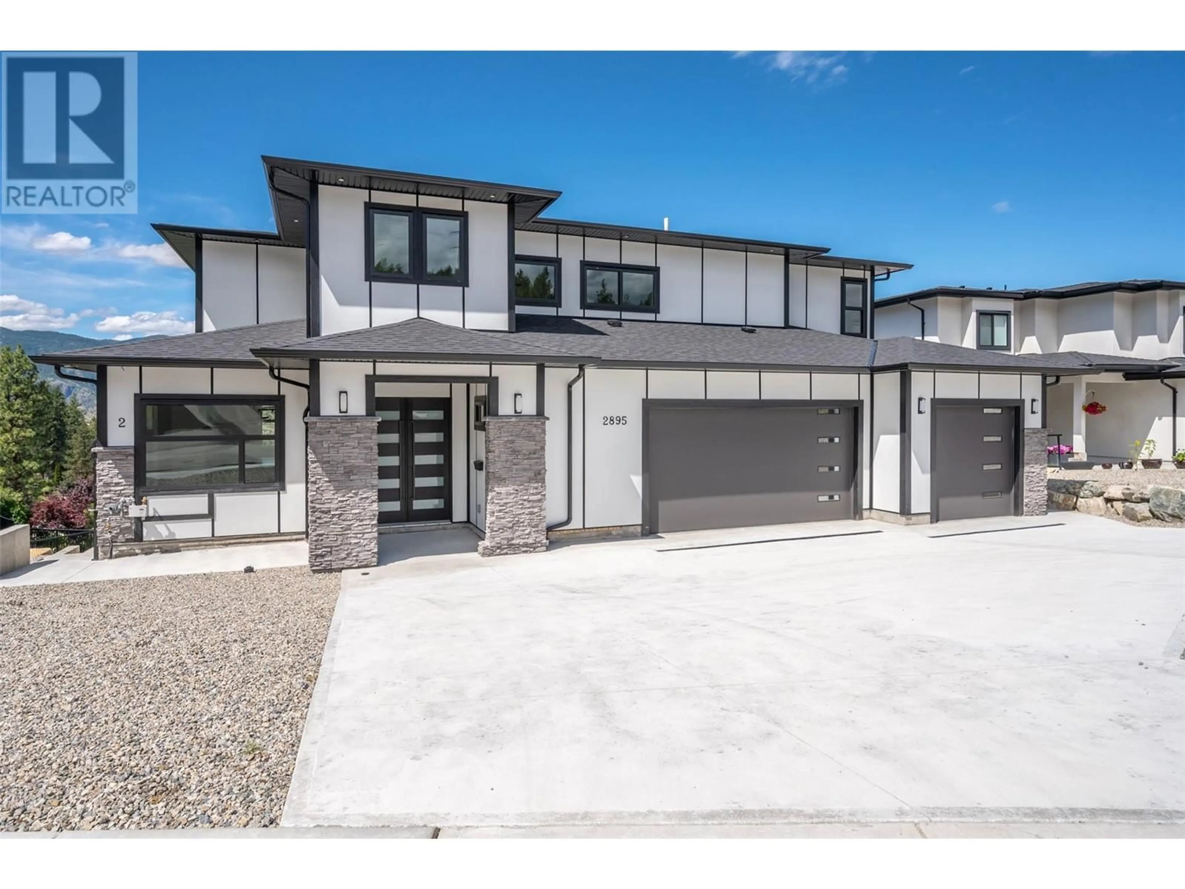 Frontside or backside of a home, the street view for 2895 Partridge Drive, Penticton British Columbia V2A9E7