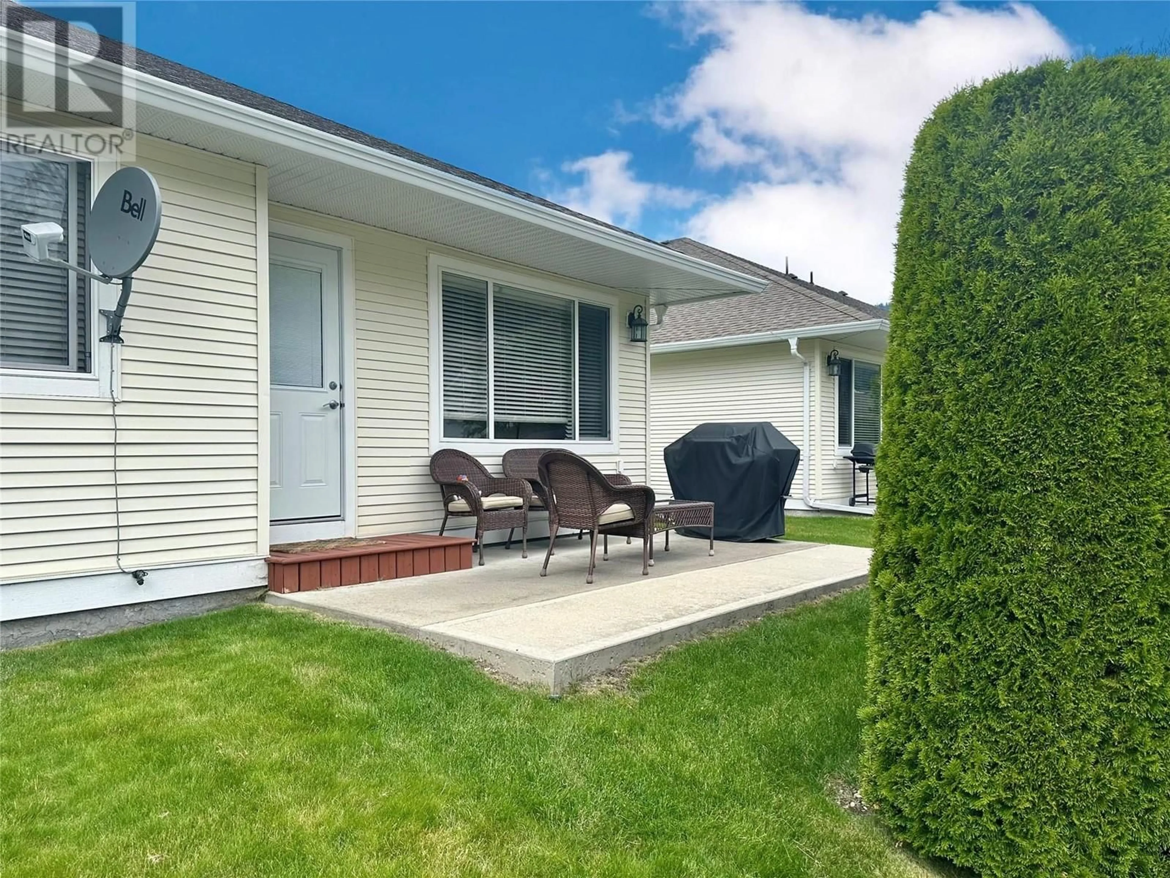 Patio, the fenced backyard for 222 Martin Street Unit# 103, Sicamous British Columbia V0E2V1