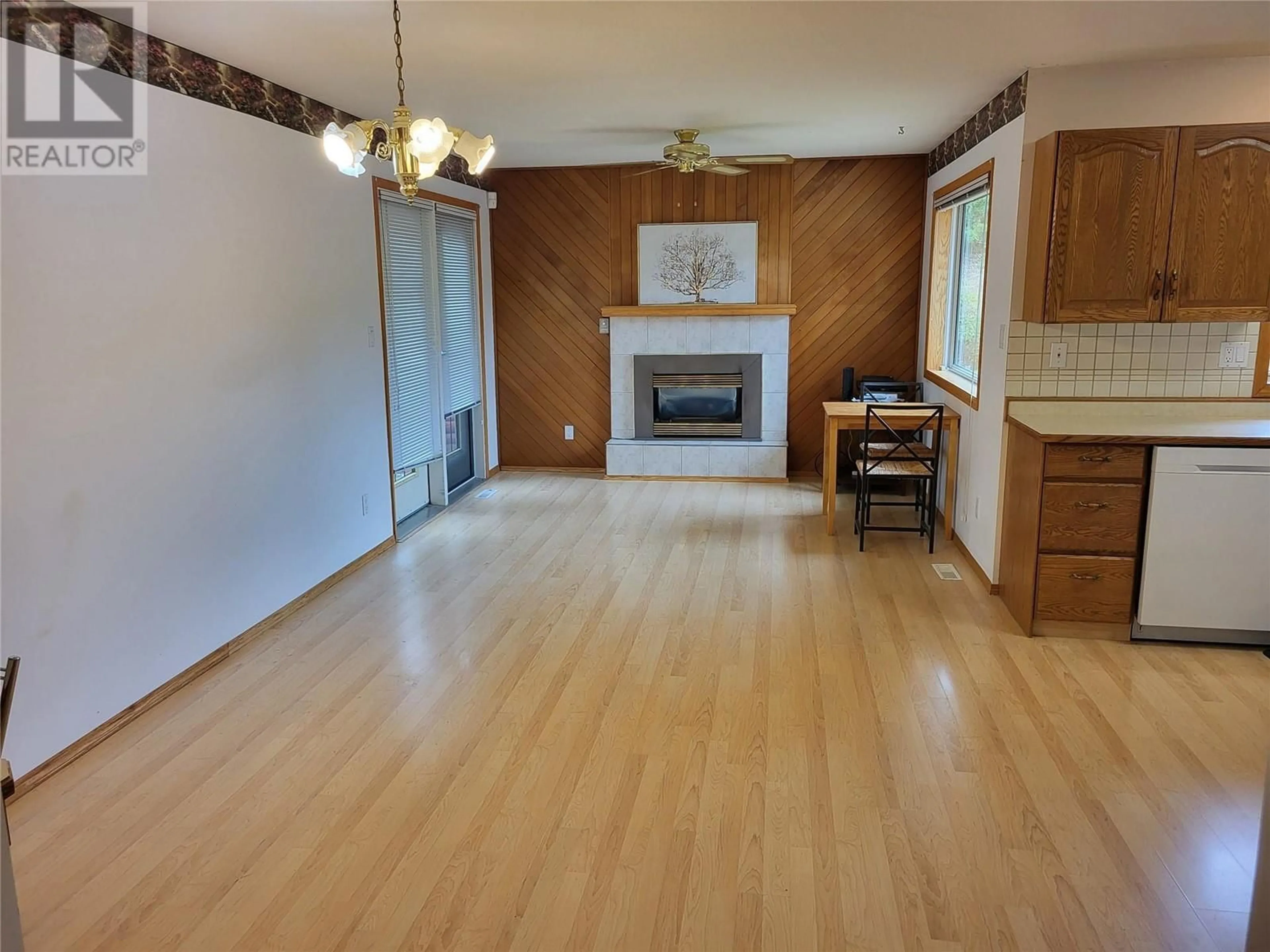 A pic of a room, wood floors for 6184 Saint Martin Place, Oliver British Columbia V0H1T0