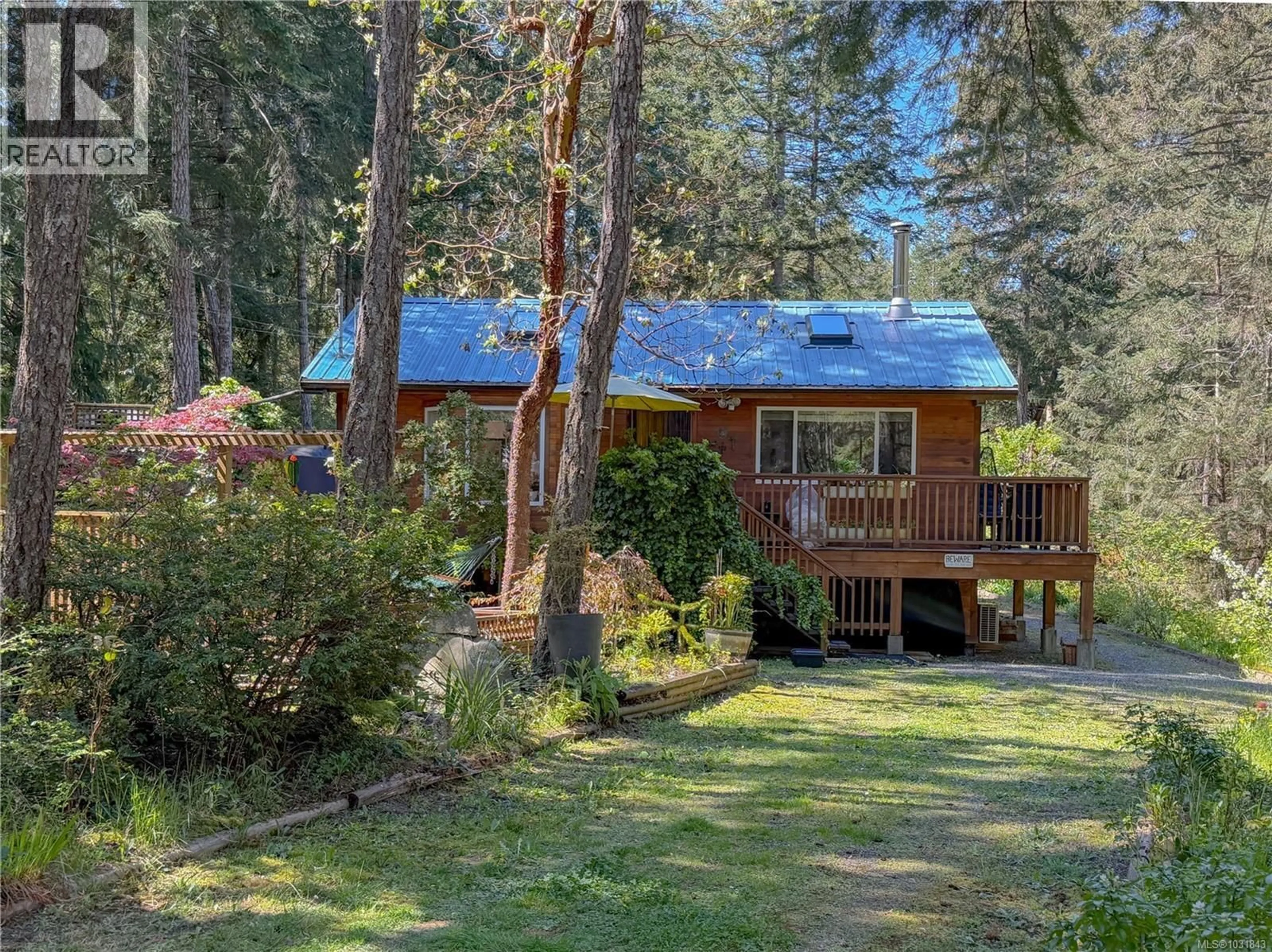 A pic from outside/outdoor area/front of a property/back of a property/a pic from drone, forest/trees view for 1085 SANSOM ROAD, Gabriola Island British Columbia V0R1X2