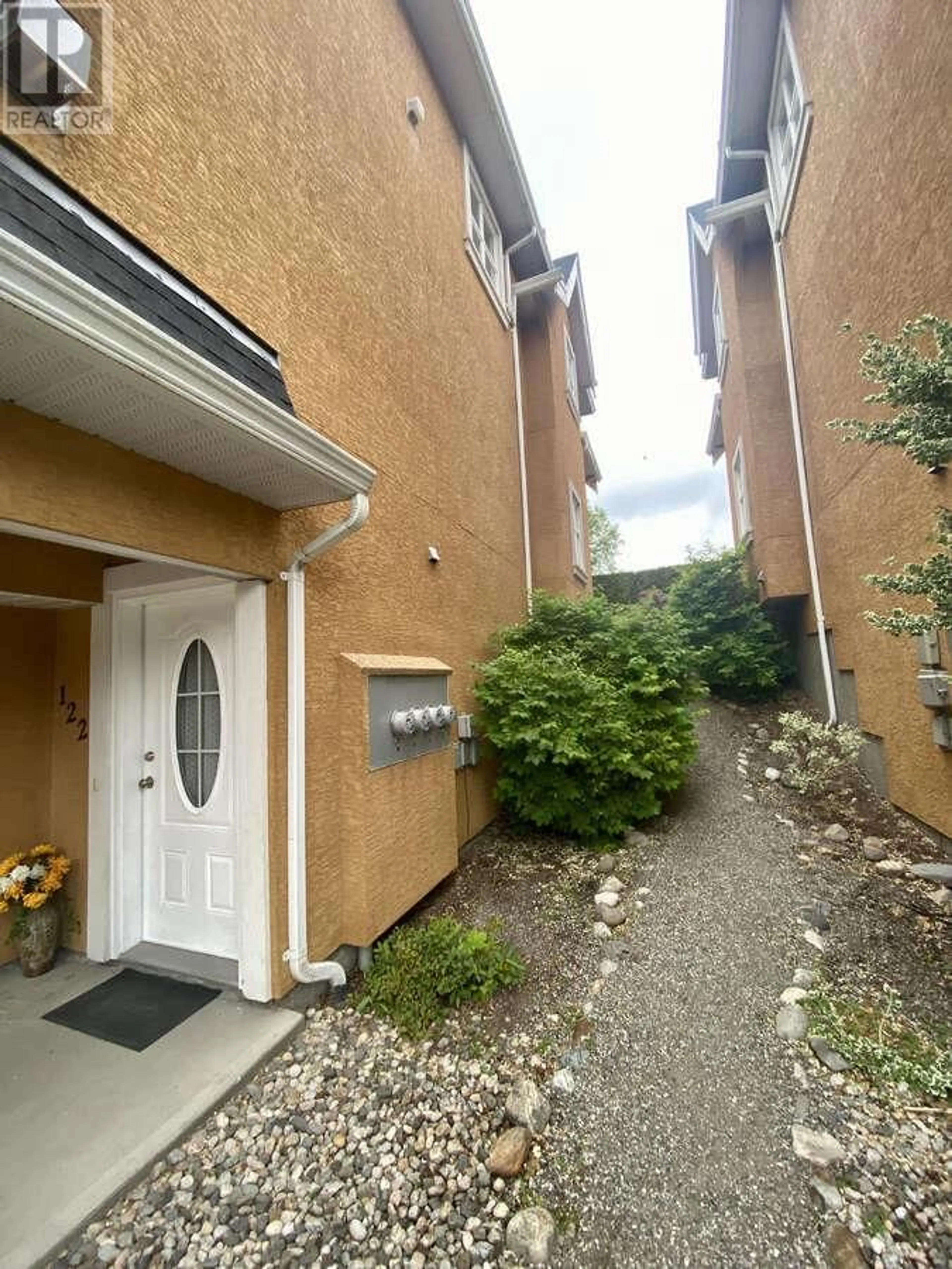 A pic from exterior of the house or condo, the street view for 456 McPhee Street Unit# 122, Kelowna British Columbia V1X8C5