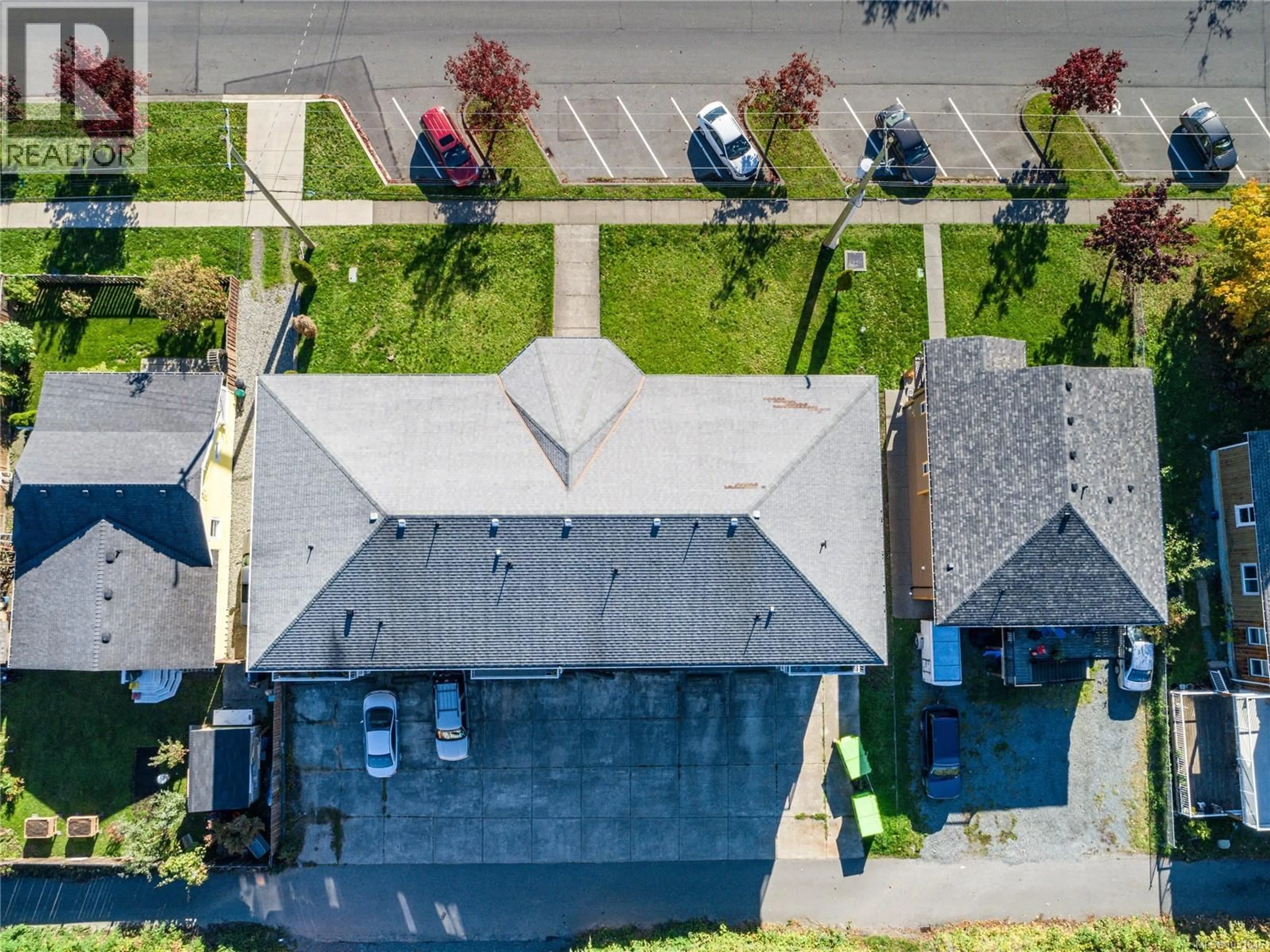 A pic from outside/outdoor area/front of a property/back of a property/a pic from drone, street for 1 - 1587 JOAN AVENUE, Crofton British Columbia V0R1R0