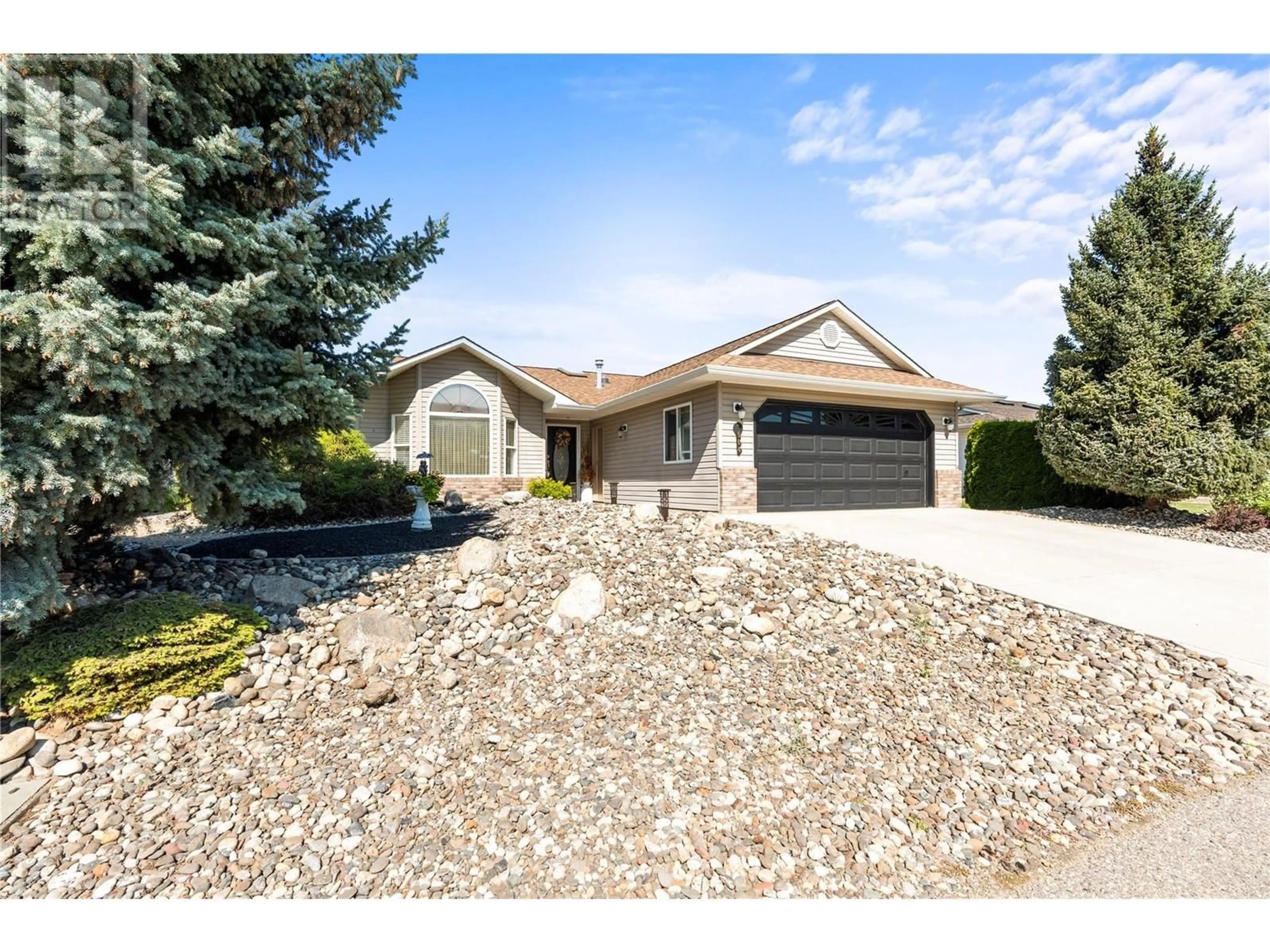 Frontside or backside of a home for 504 5 Street Lot# 27-72, Vernon British Columbia V1H1Z1