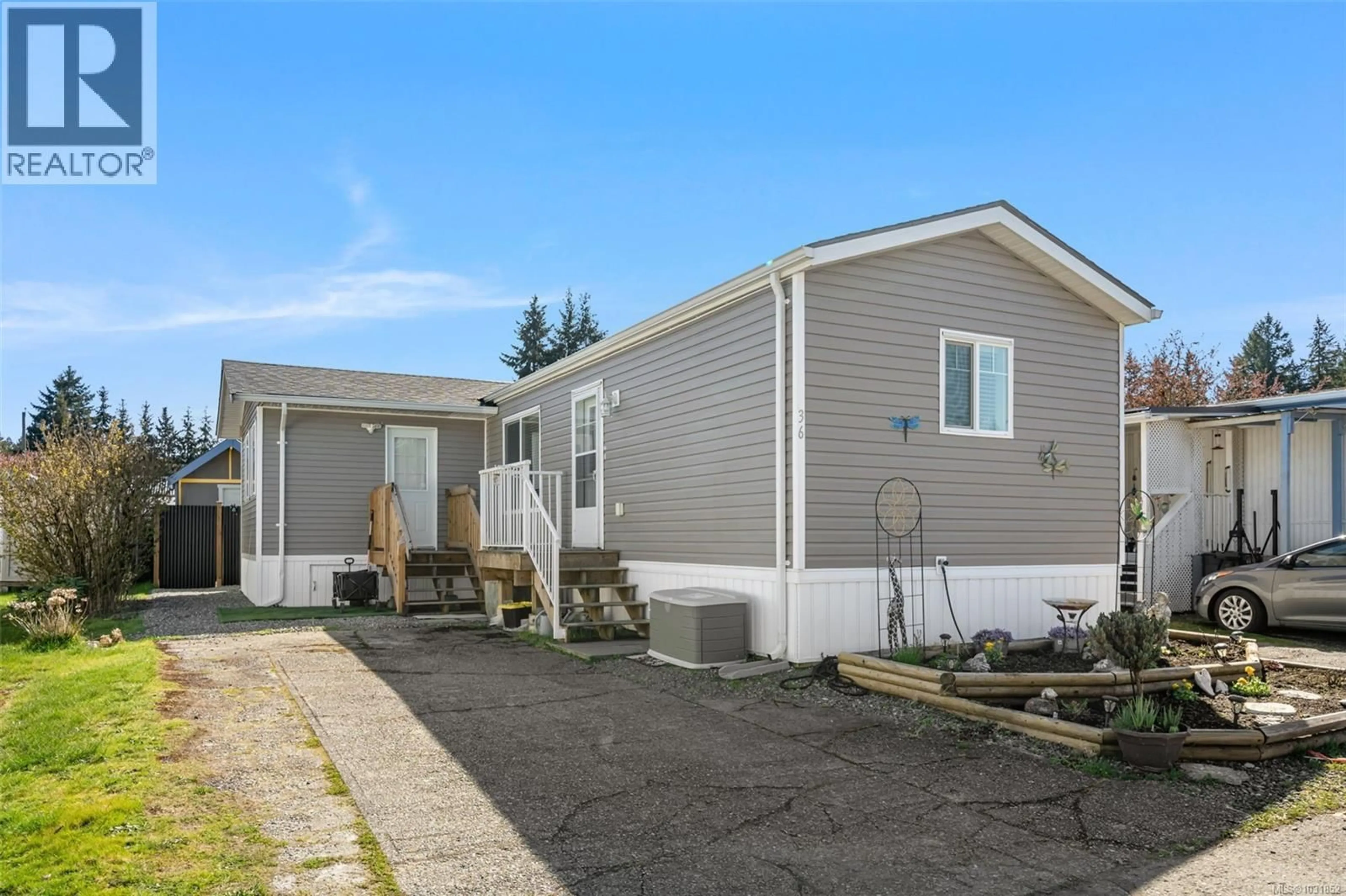 Home with vinyl exterior material, street for 36 - 3497 GIBBINS ROAD, Duncan British Columbia V9L6C9