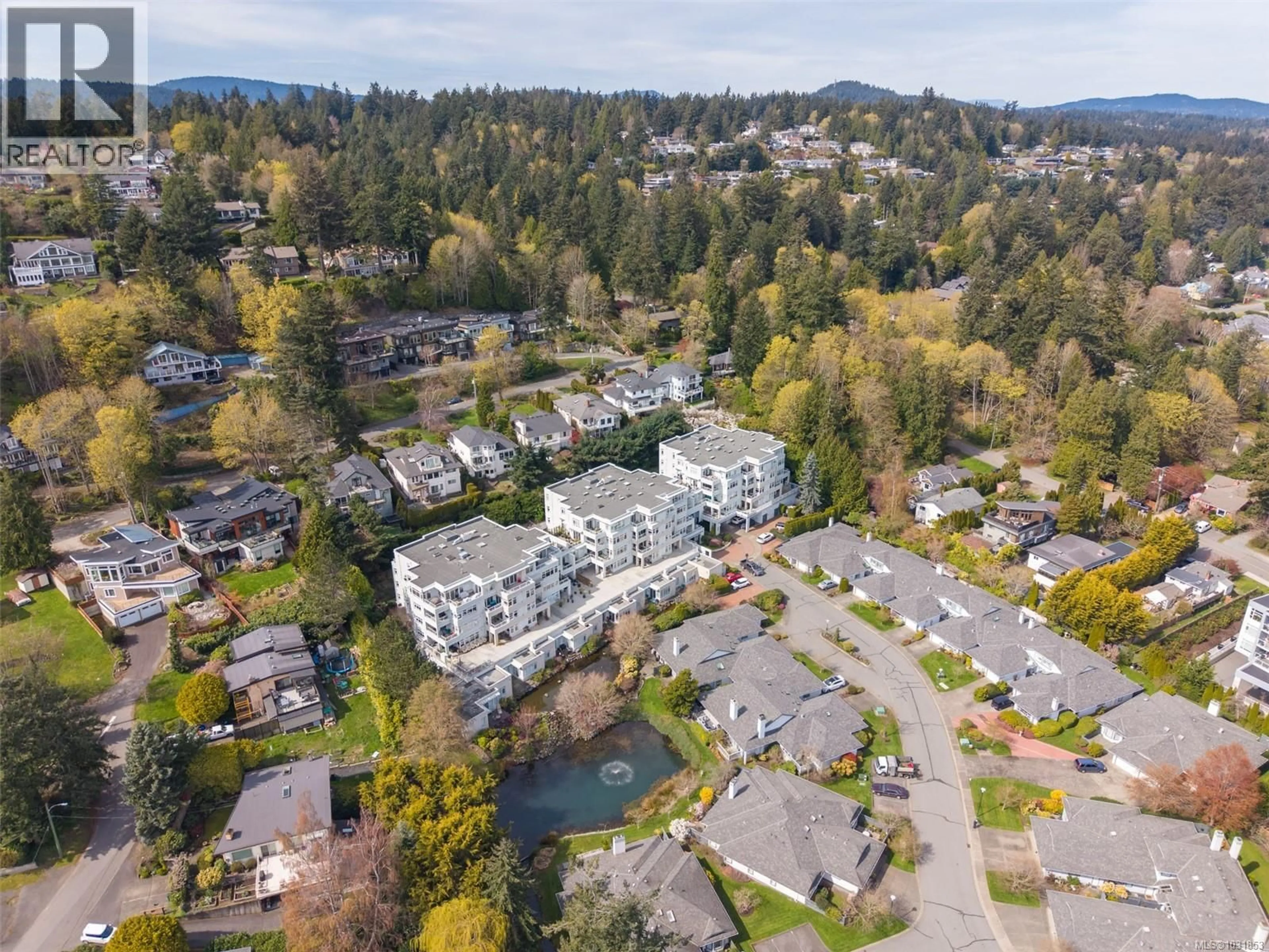 A pic from outside/outdoor area/front of a property/back of a property/a pic from drone, mountain view for 206 - 5110 CORDOVA BAY ROAD, Saanich British Columbia V8Y2K5