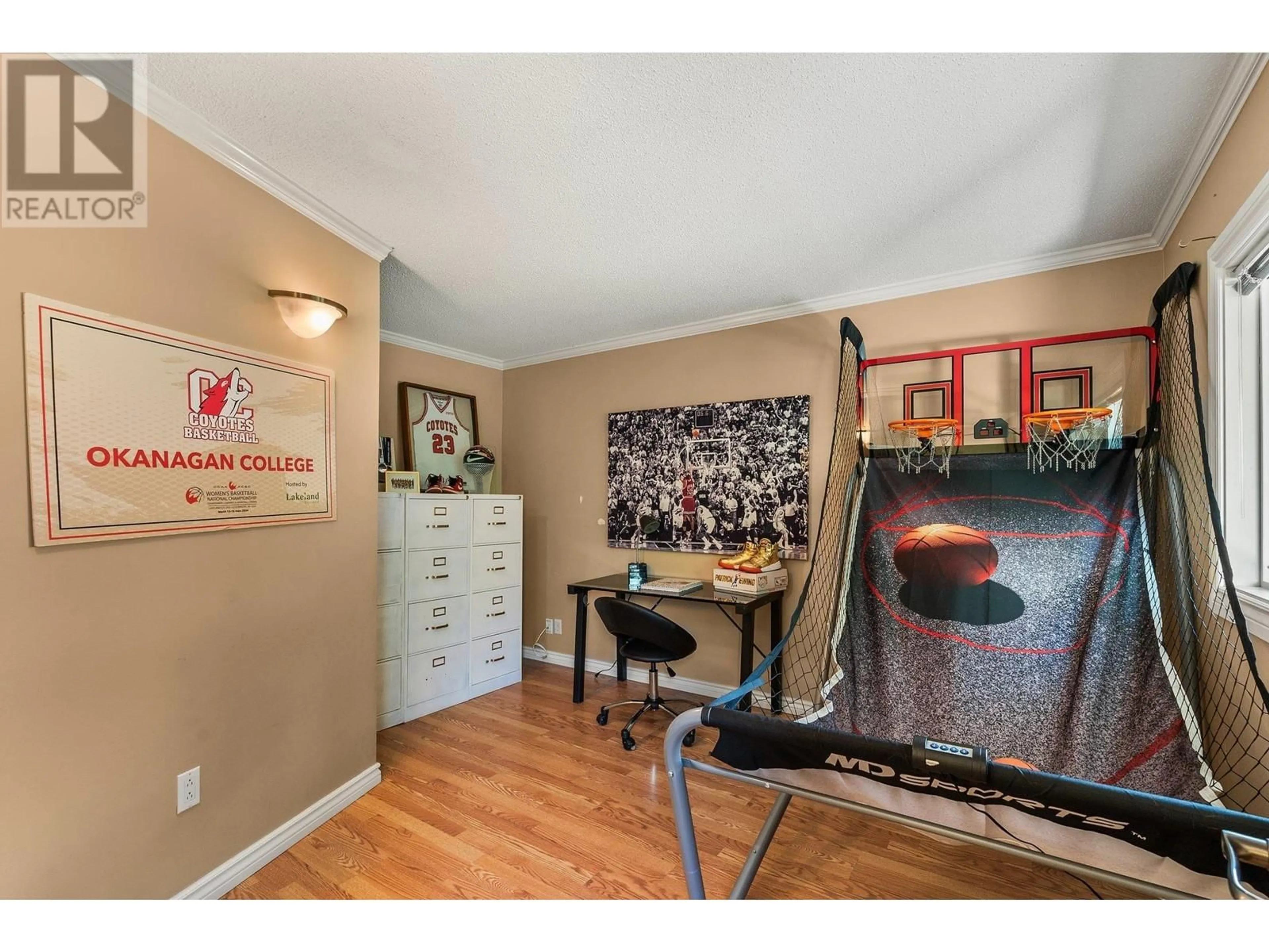 A pic of a room, wood floors for 2677 Mappin Court, Kelowna British Columbia V1Y8H8