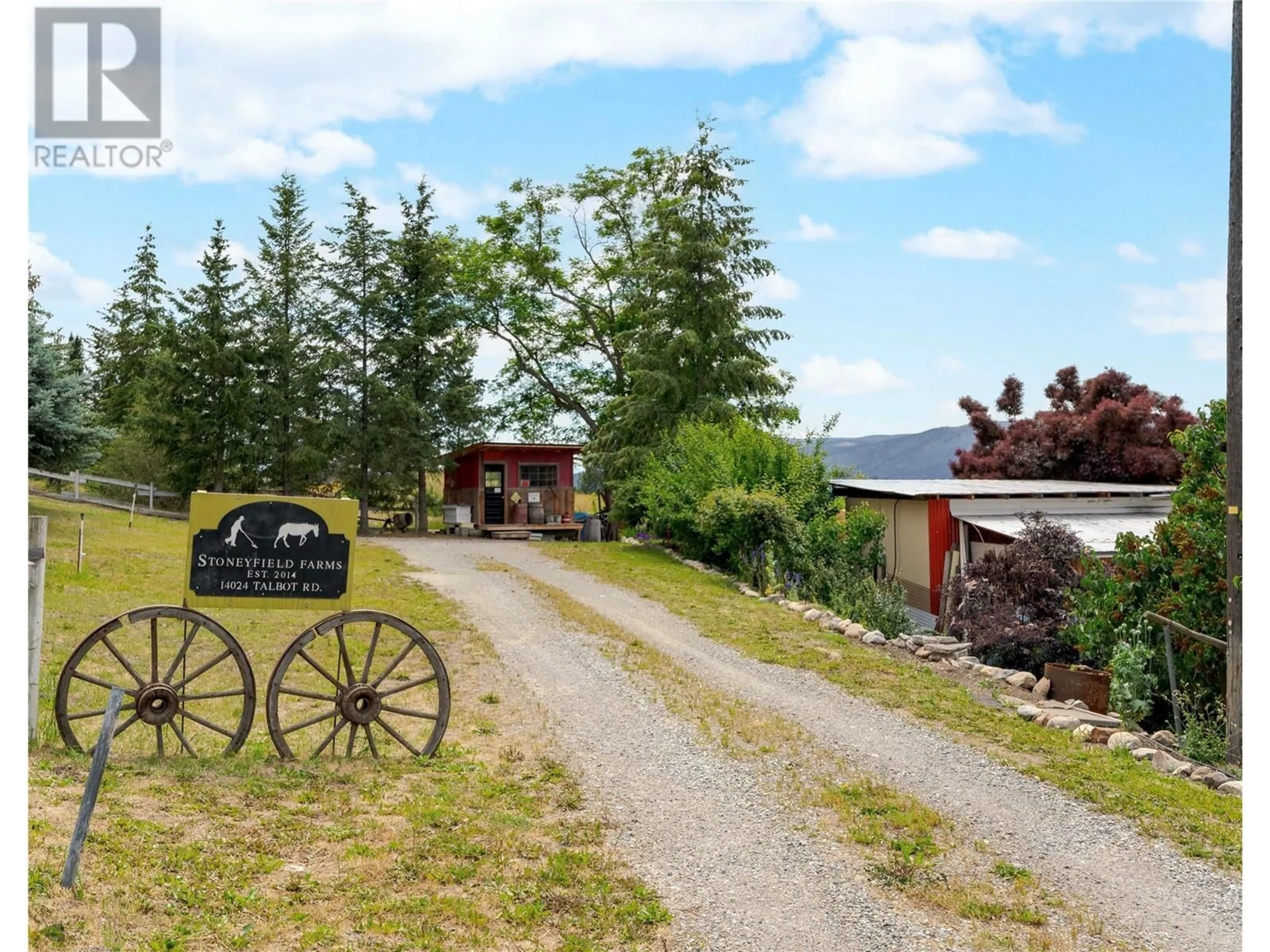 A pic from outside/outdoor area/front of a property/back of a property/a pic from drone, mountain view for 14024 Talbot Road, Lake Country British Columbia V4V2C2