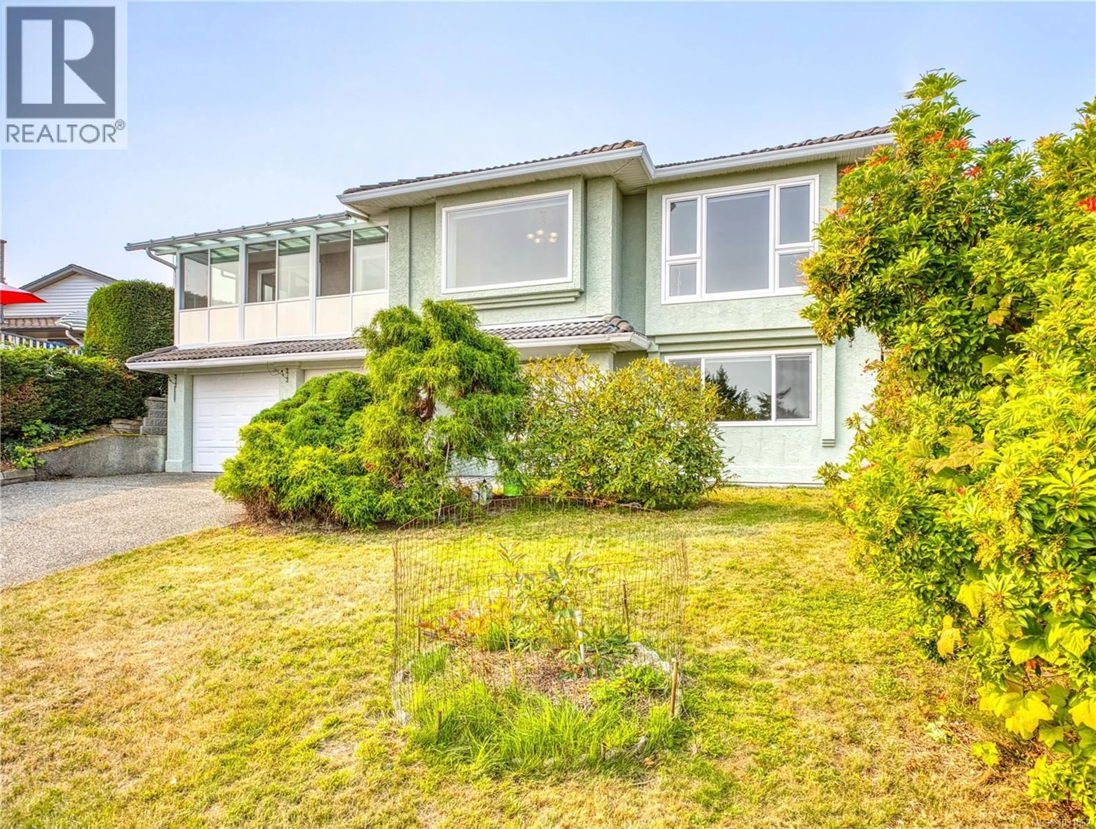 A pic from outside/outdoor area/front of a property/back of a property/a pic from drone, street for 6045 ICARUS DRIVE, Nanaimo British Columbia V9V1B7