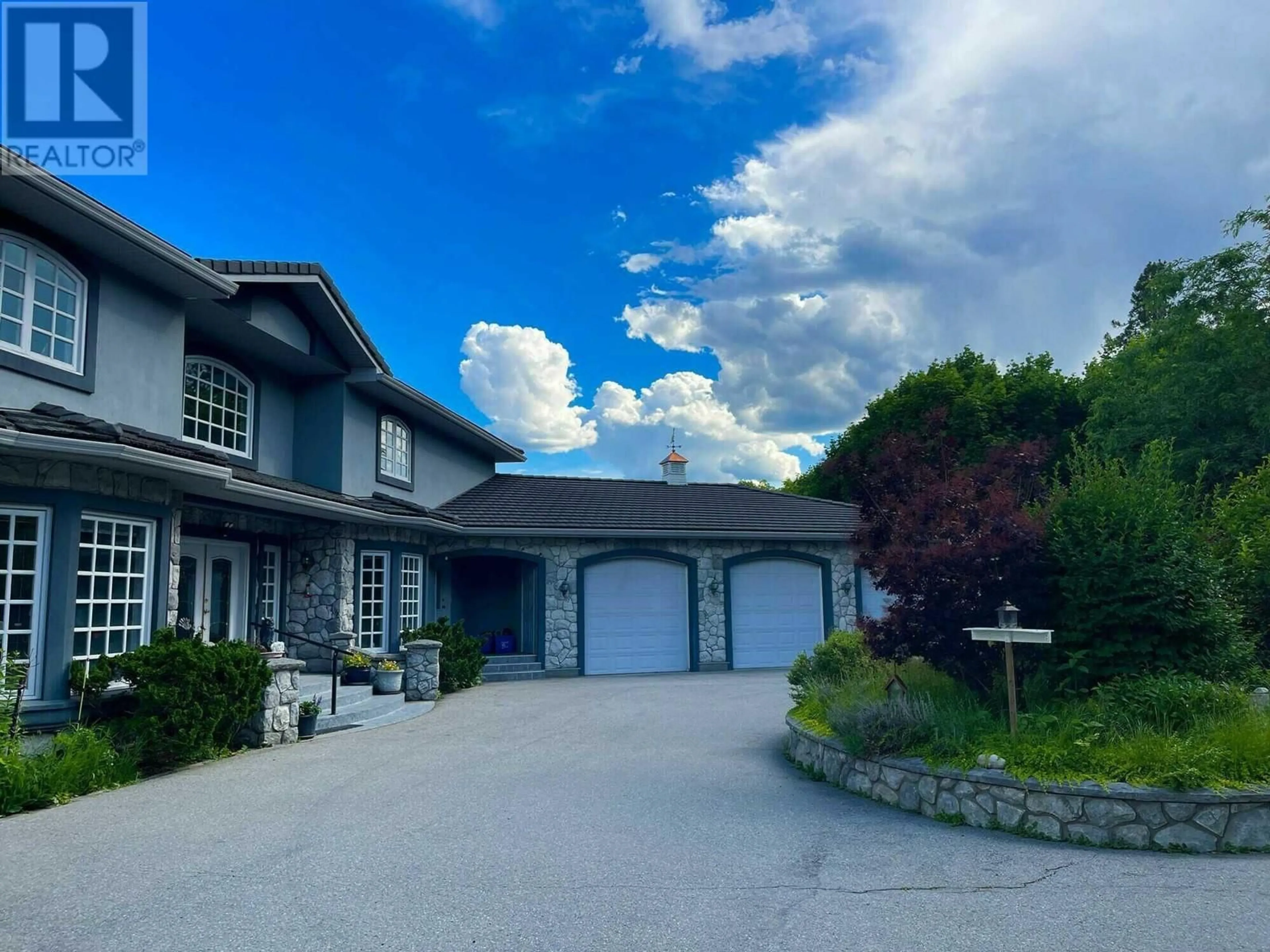 A pic from outside/outdoor area/front of a property/back of a property/a pic from drone, unknown for 317 HYSLOP DRIVE, Penticton British Columbia V2A8Z9