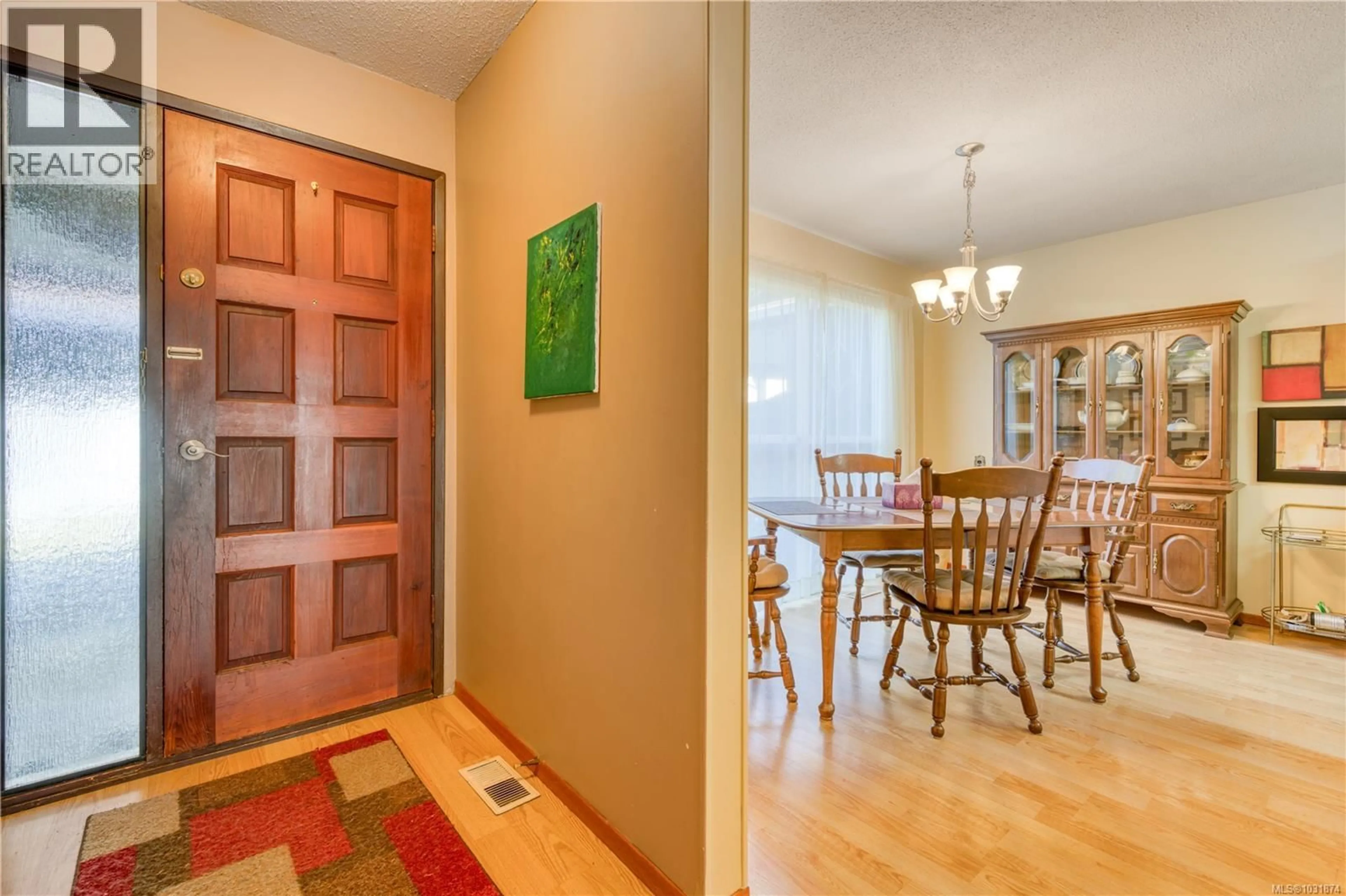 Dining room, wood/laminate floor for 87 MCKAY CRESCENT, Port Alice British Columbia V0N2N0