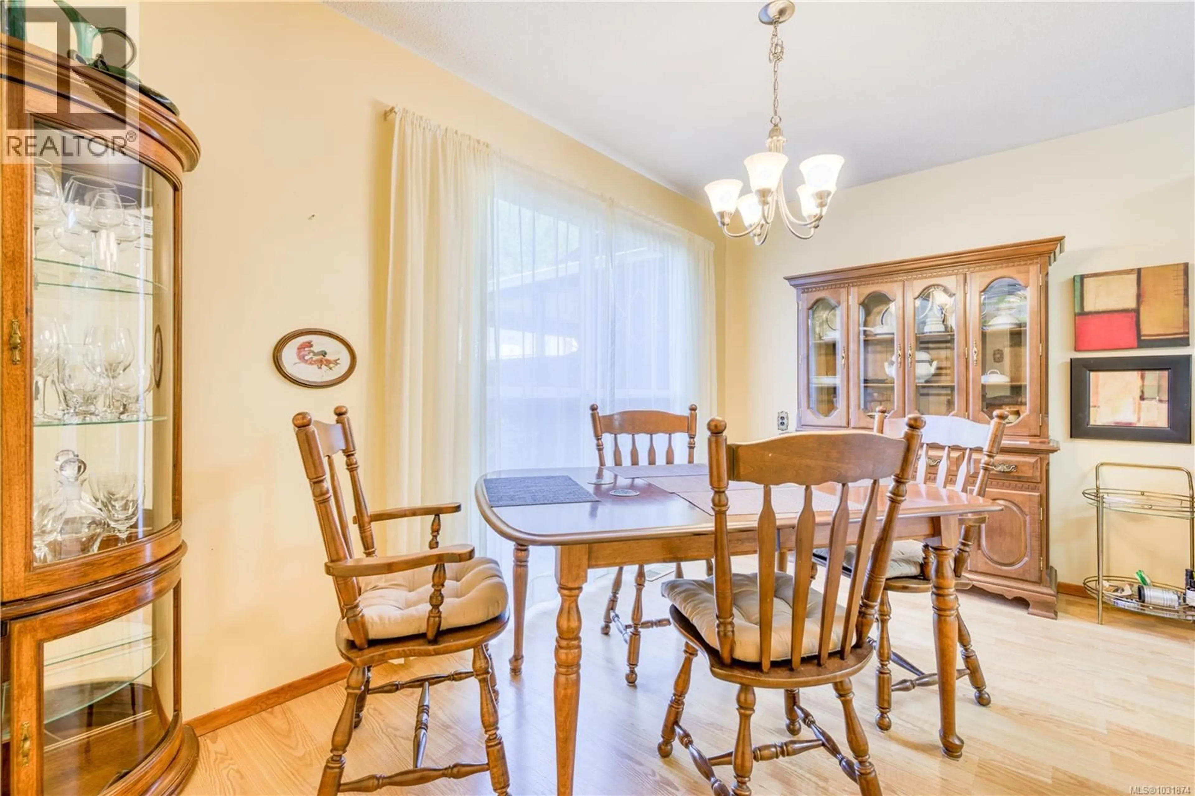 Dining room, wood/laminate floor for 87 MCKAY CRESCENT, Port Alice British Columbia V0N2N0