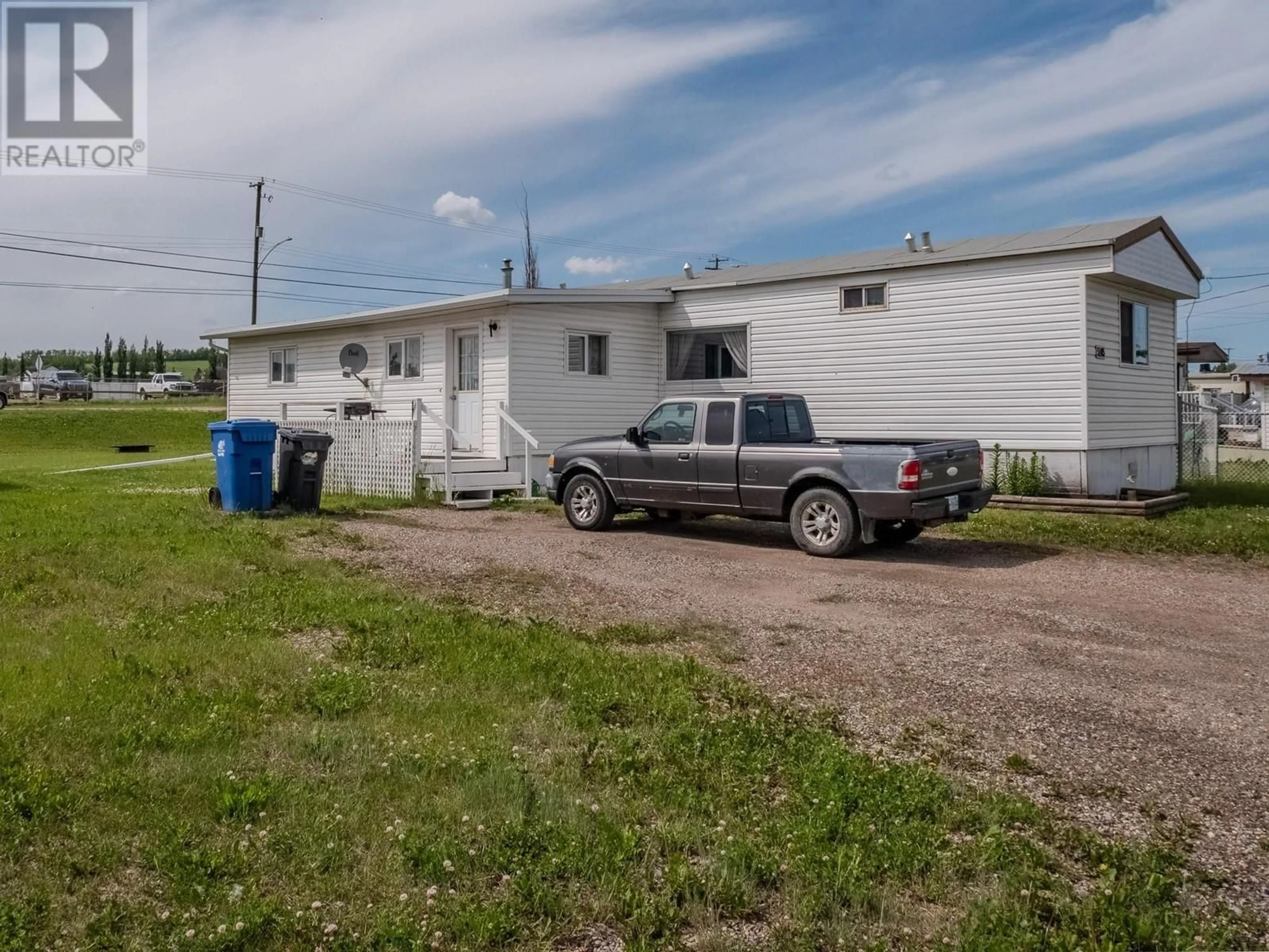 Frontside or backside of a home for 5105 Sukrit Parmar Lane, Pouce Coupe British Columbia V0C2C0