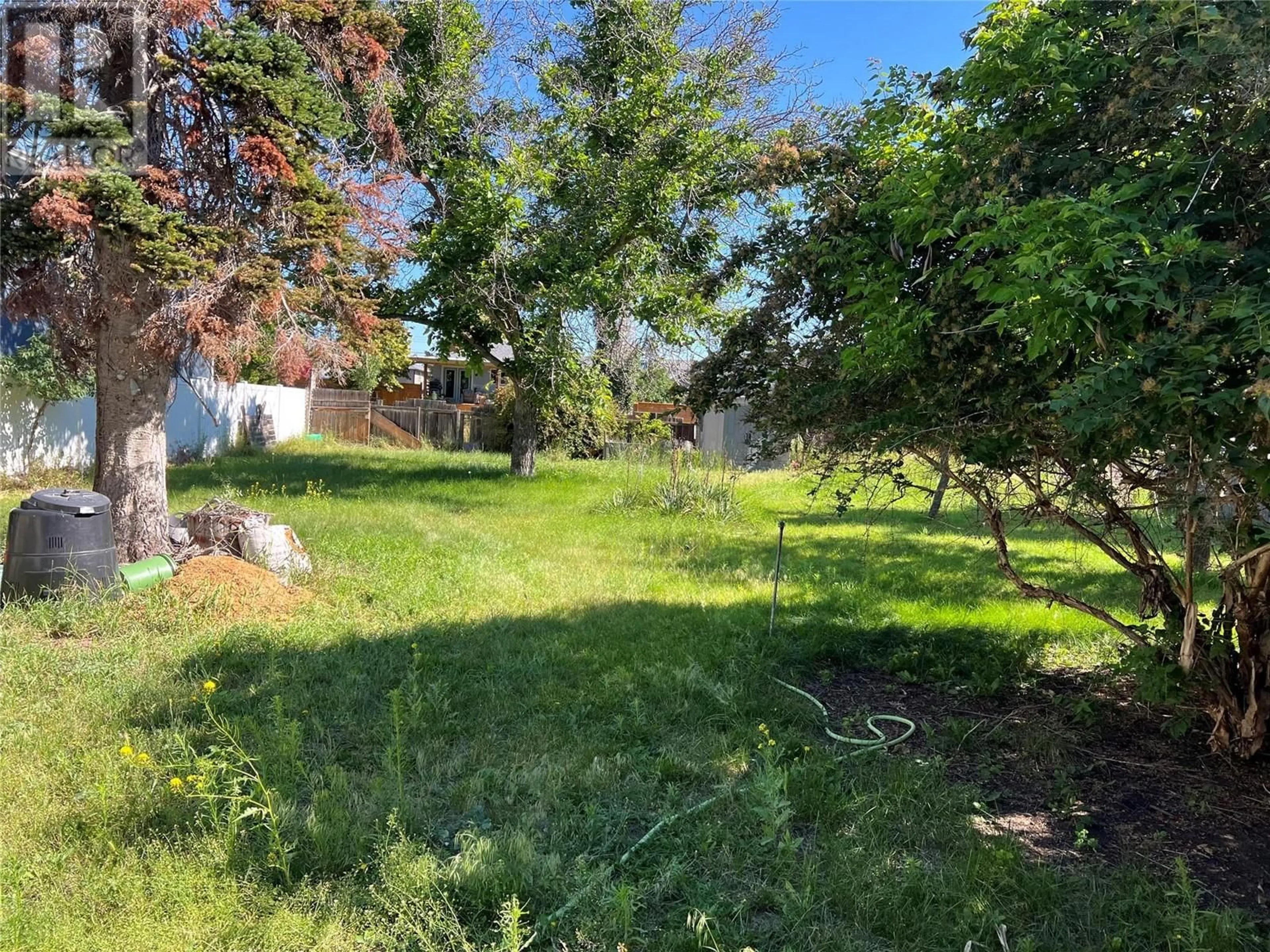 A pic from outside/outdoor area/front of a property/back of a property/a pic from drone, forest/trees view for 383 SCOTT AVENUE, Penticton British Columbia V2A2J7