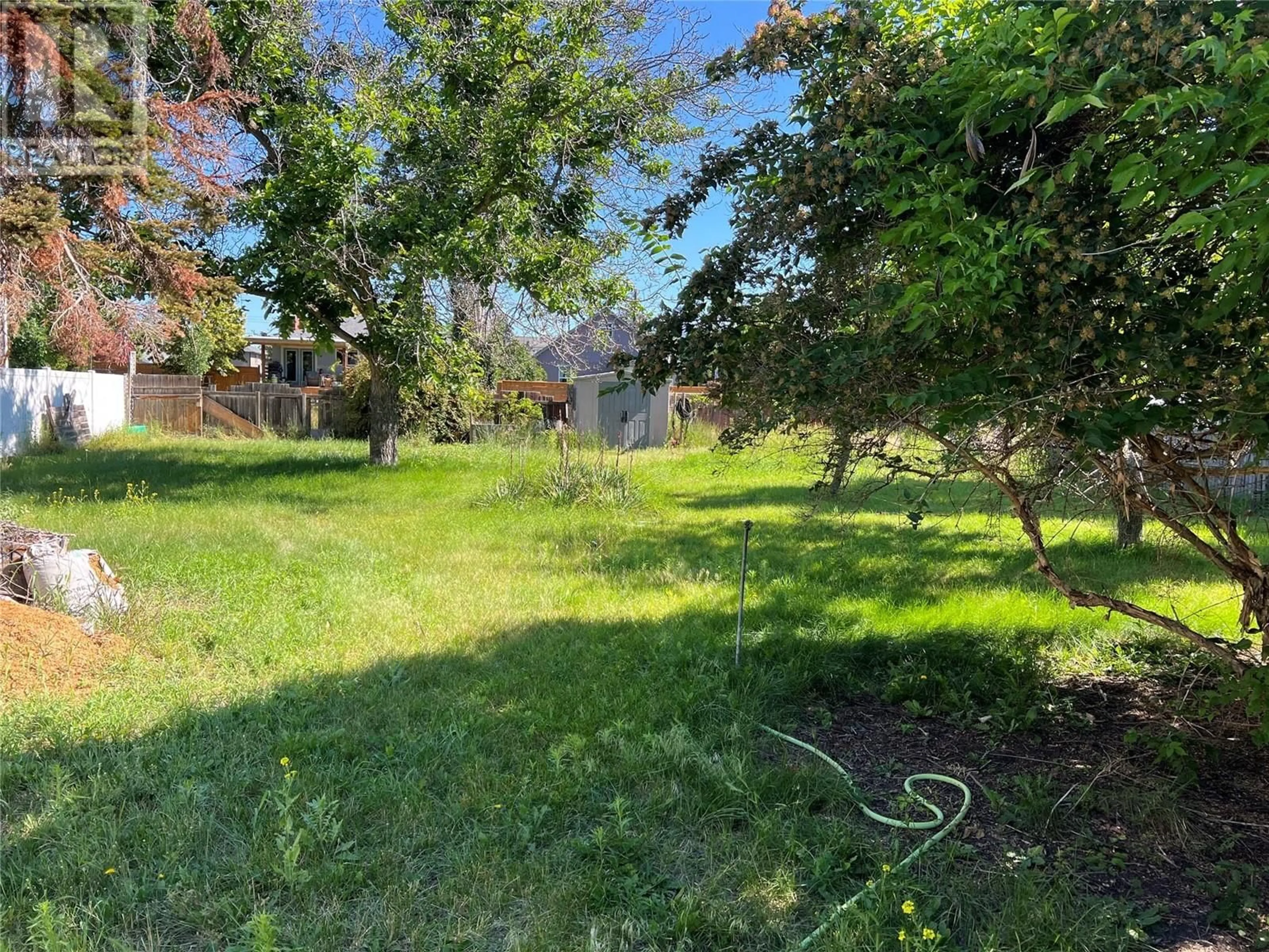 A pic from outside/outdoor area/front of a property/back of a property/a pic from drone, forest/trees view for 383 SCOTT AVENUE, Penticton British Columbia V2A2J7