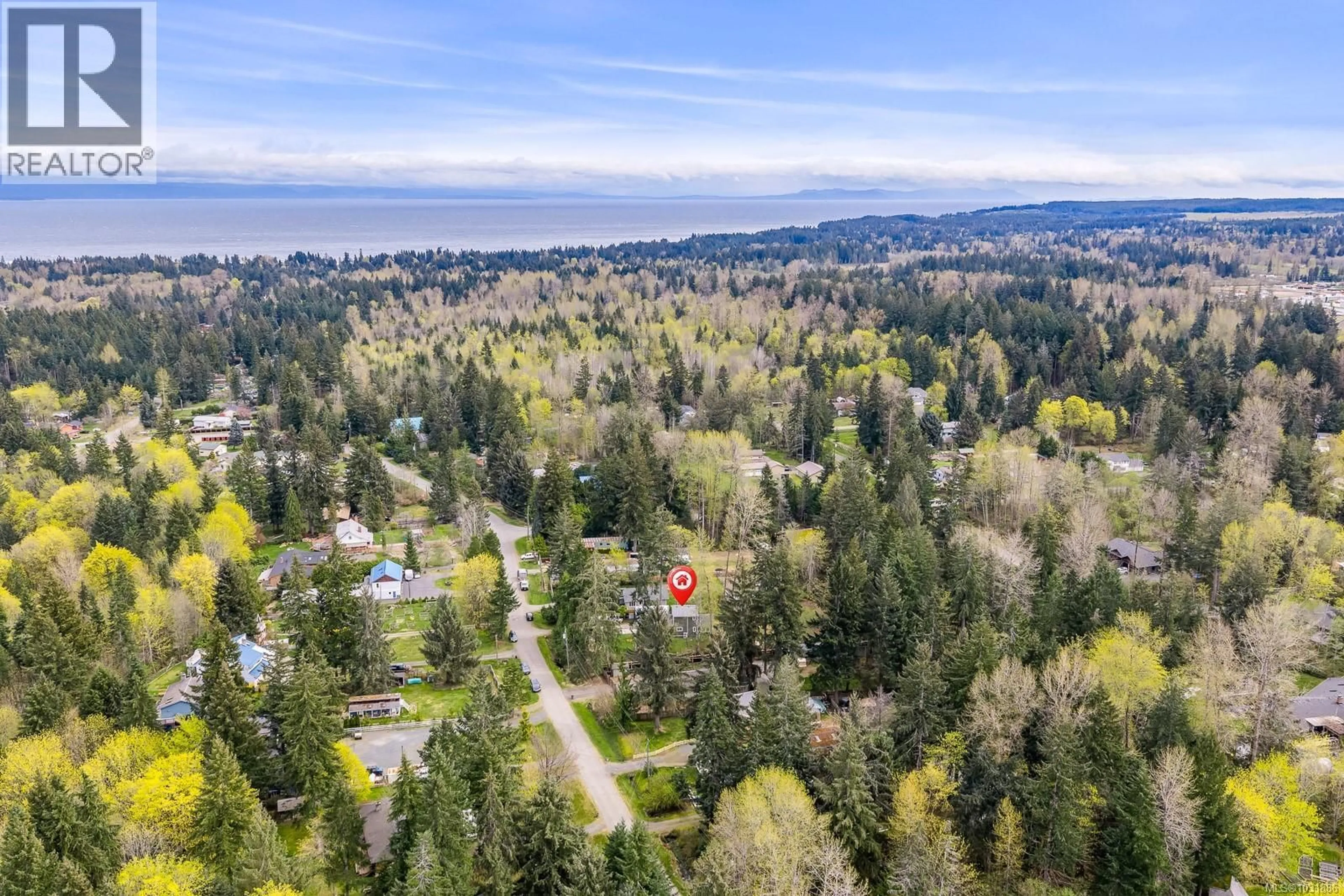 A pic from outside/outdoor area/front of a property/back of a property/a pic from drone, forest/trees view for 2491 OAKES ROAD, Black Creek British Columbia V9J1J1