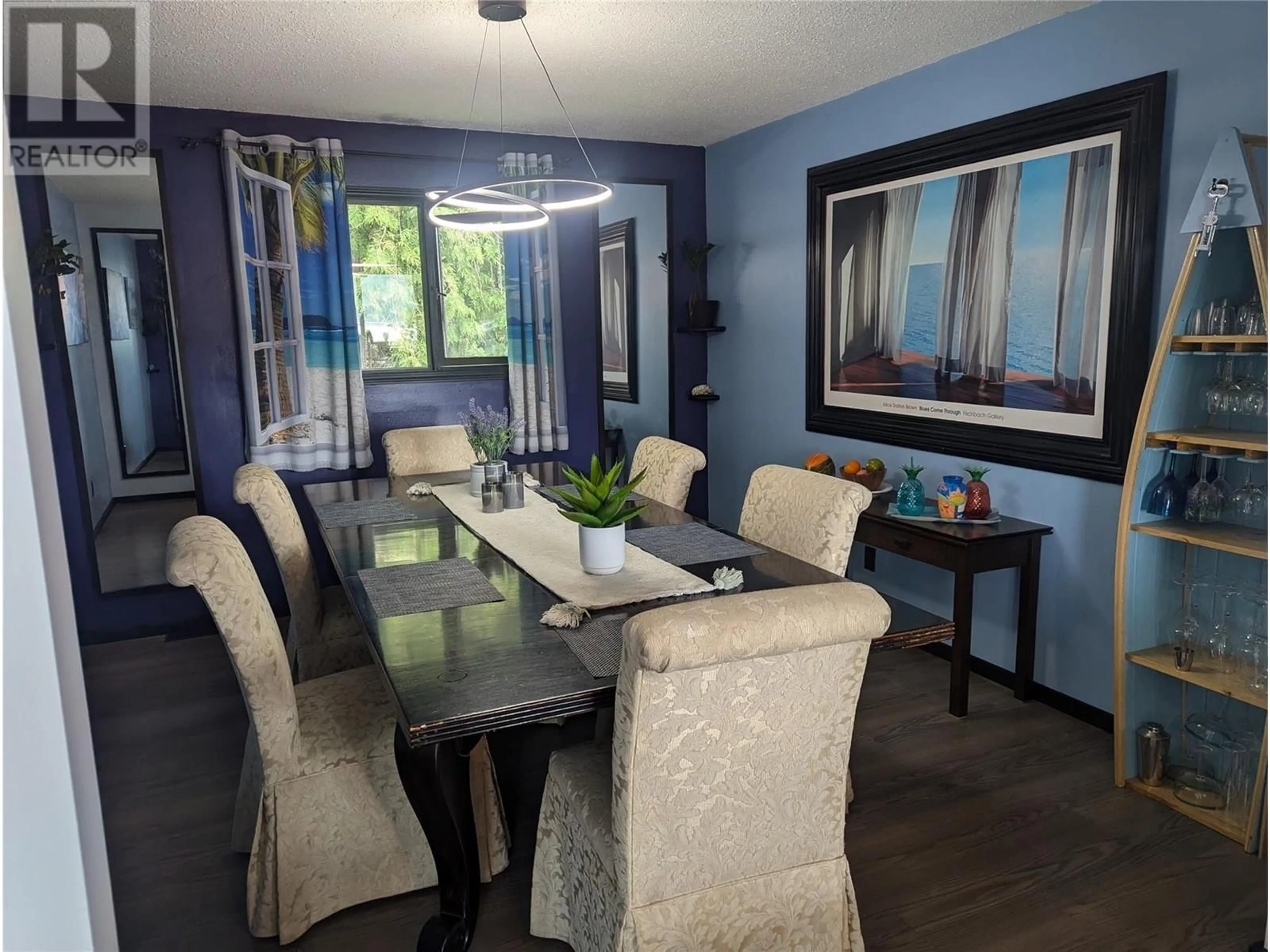 Dining room, wood floors, cottage for 7780 Bentley Road, Anglemont British Columbia V0E1M8