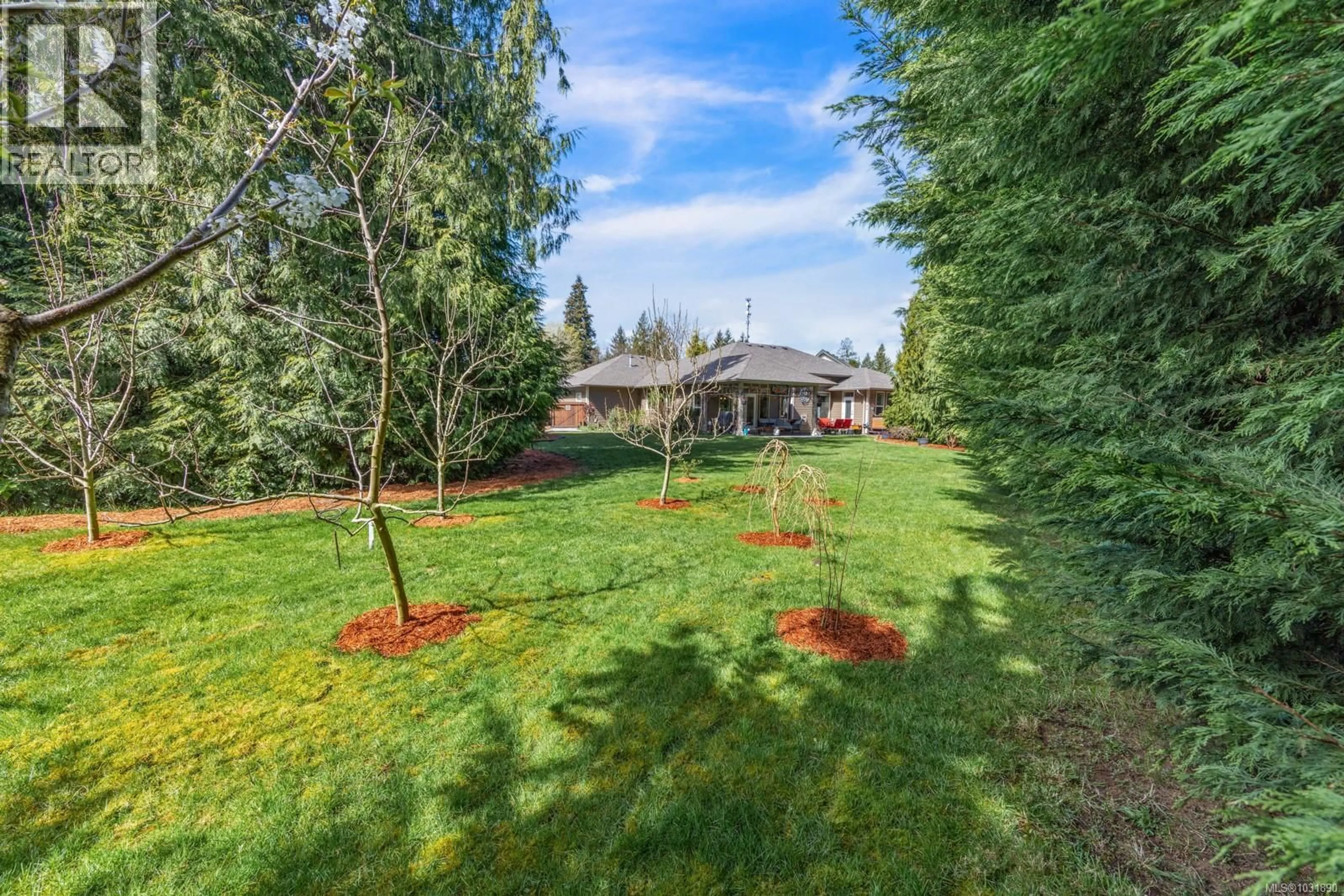 A pic from outside/outdoor area/front of a property/back of a property/a pic from drone, forest/trees view for 2483 WALBRAN PLACE, Courtenay British Columbia V9N9W9