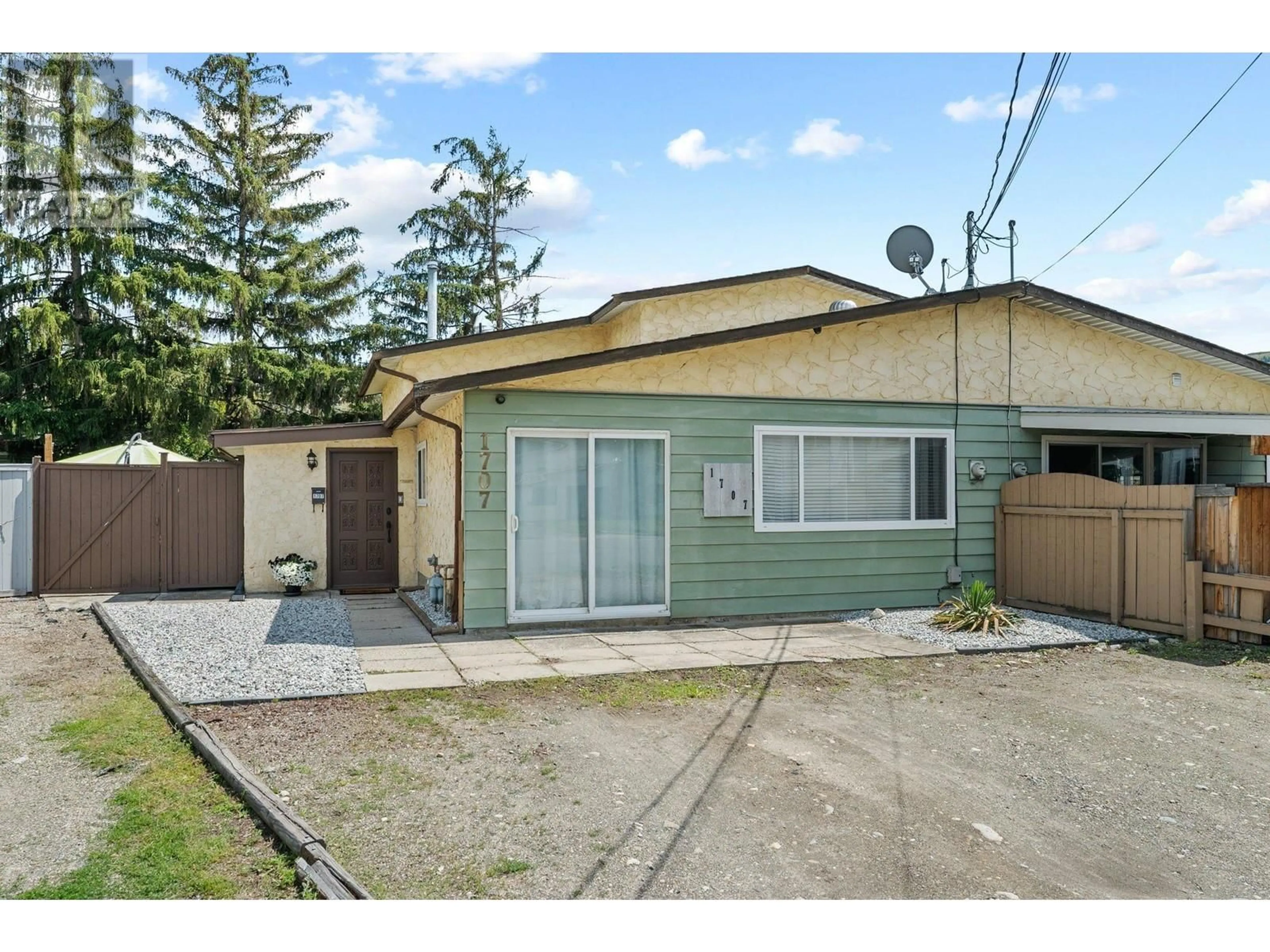 Frontside or backside of a home for 1707 44th Street, Vernon British Columbia V1T6X6