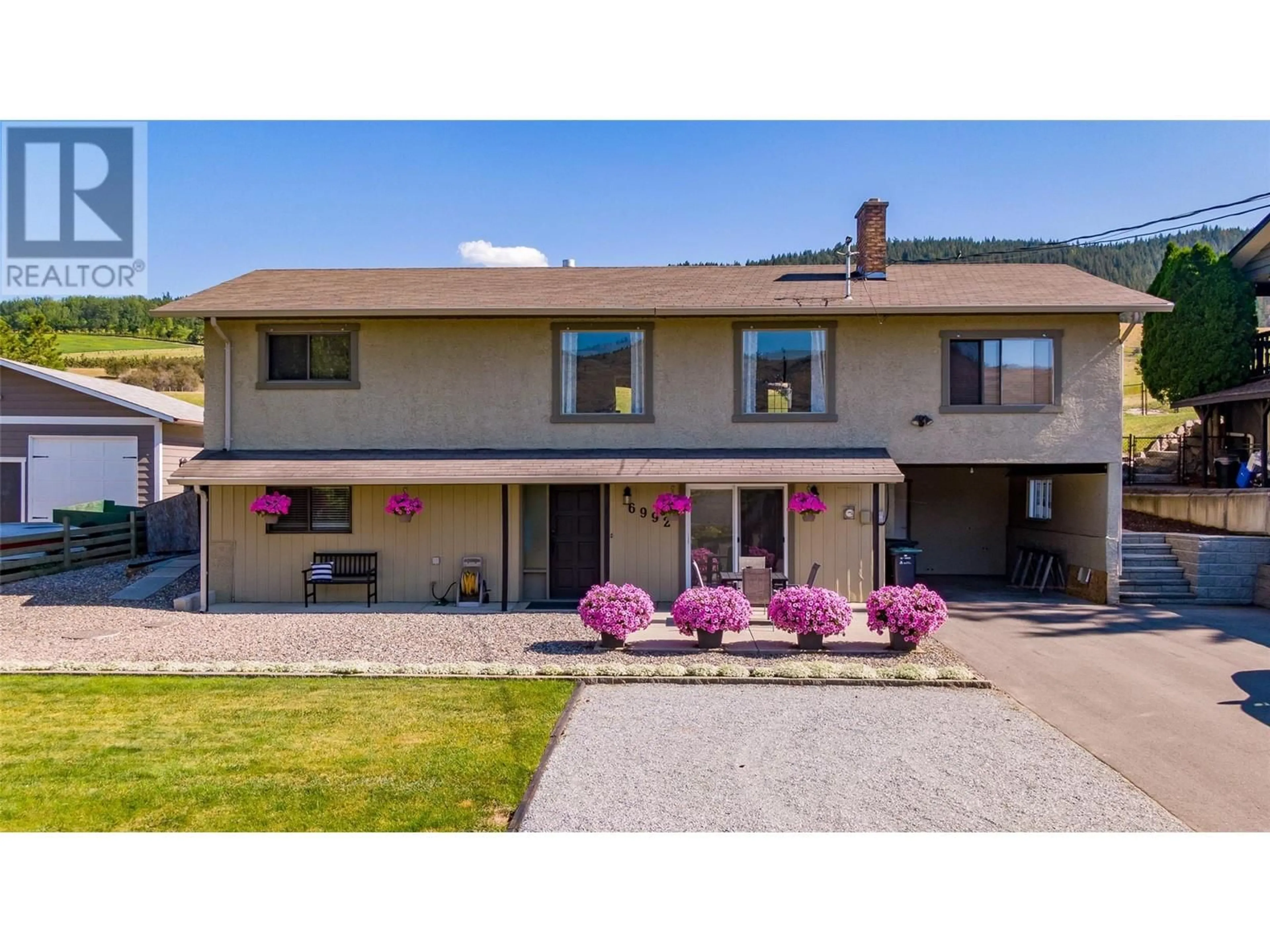 Frontside or backside of a home for 6992 Longacre Drive, Vernon British Columbia V1H1H8